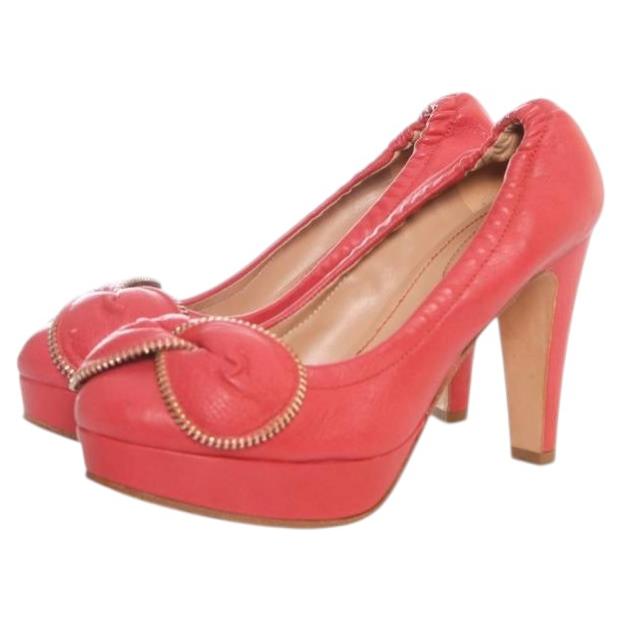 See By Chloe, pink leather platform pumps with flower with zipper For Sale