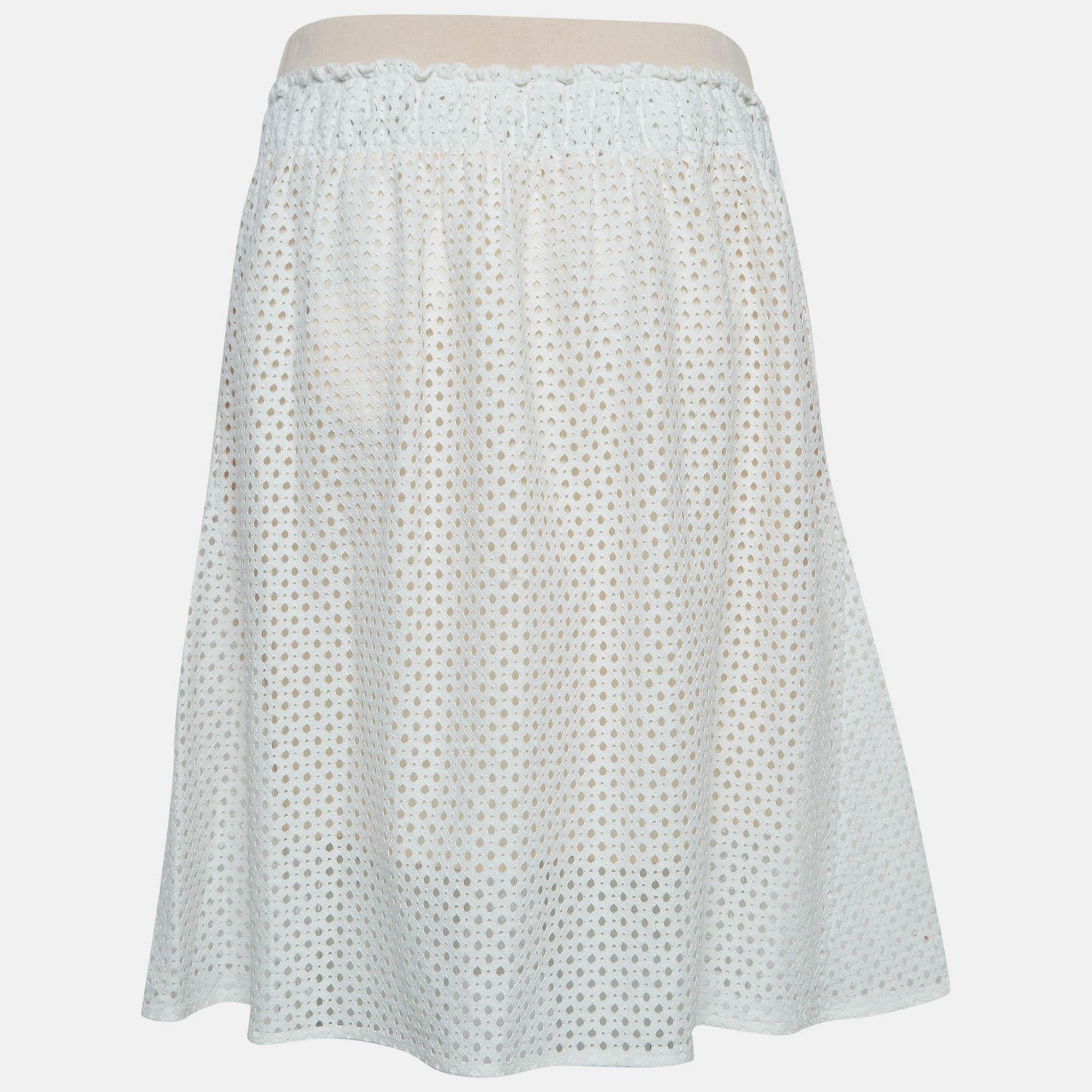 This lovely skirt is beautifully stitched from fine fabric. The comfy designer skirt has a flattering silhouette. Pair it with a simple top and strappy heels for a chic look.
