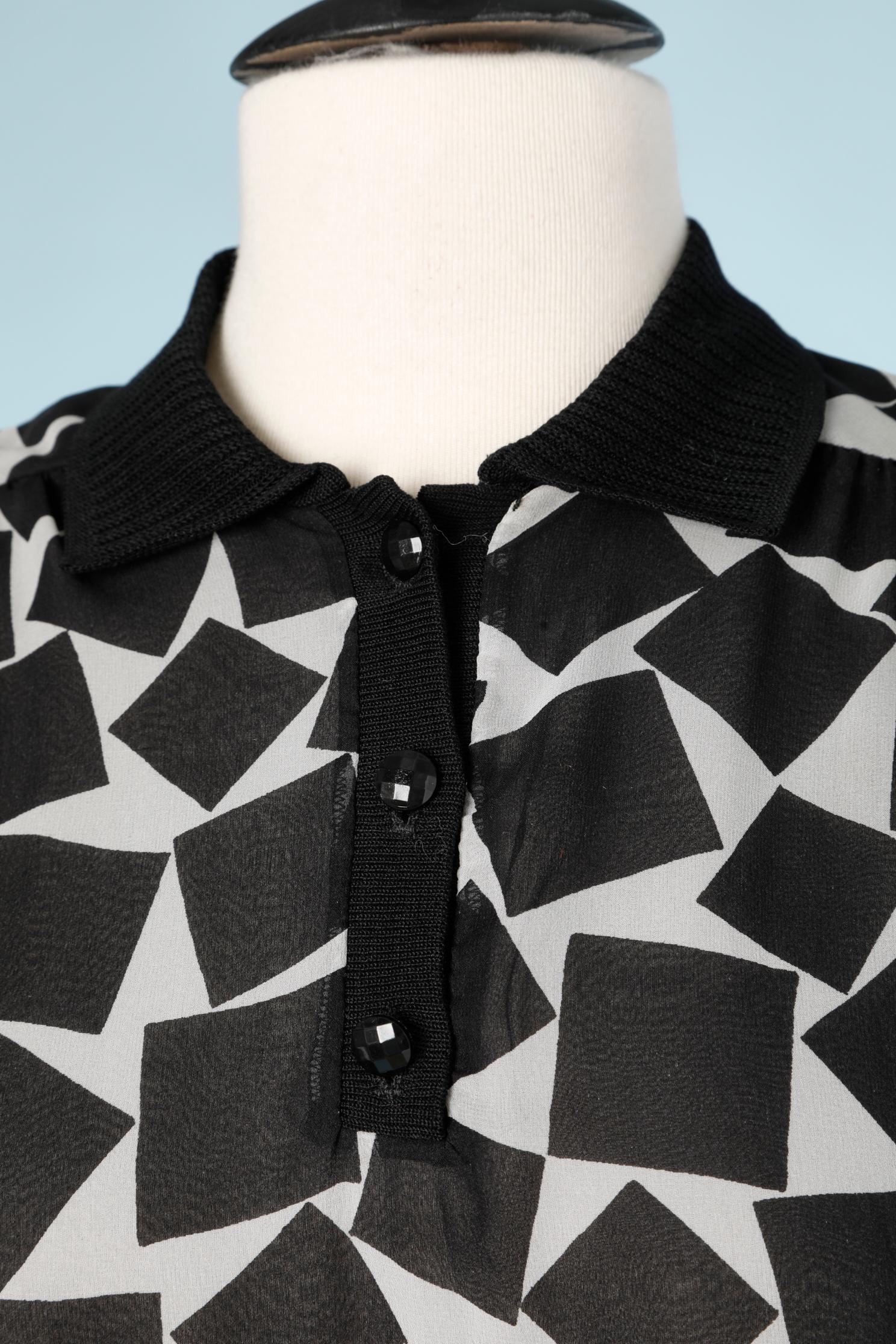 See-through printed black and white chiffon shirt. 
SIZE 6 ( Us) 