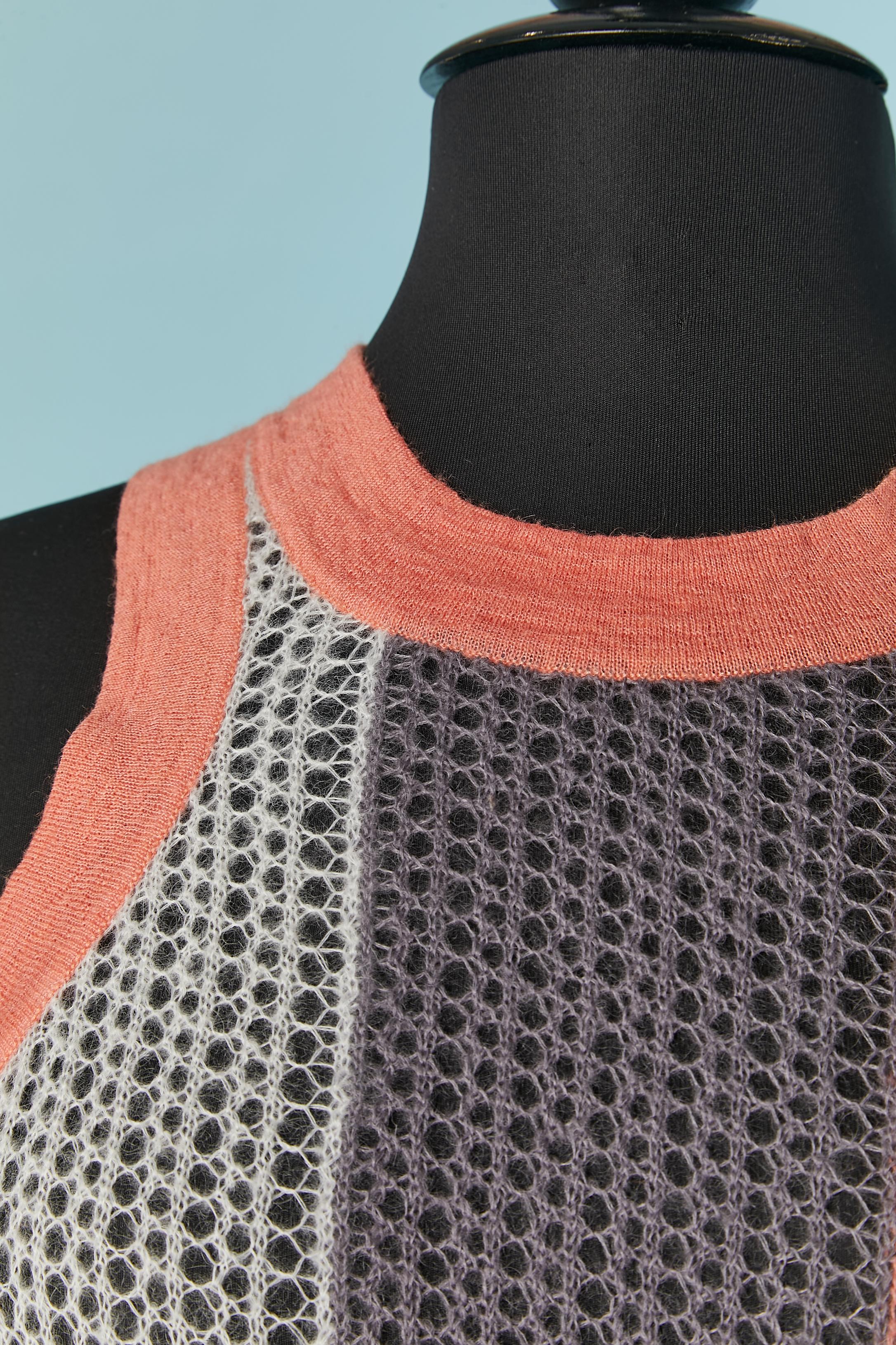 See-through sleeveless knit dress. 
Knit composition: 40% mohair, 36% wool, 24% nylon. 
 Extra thread provided. New with tag. 
SIZE S