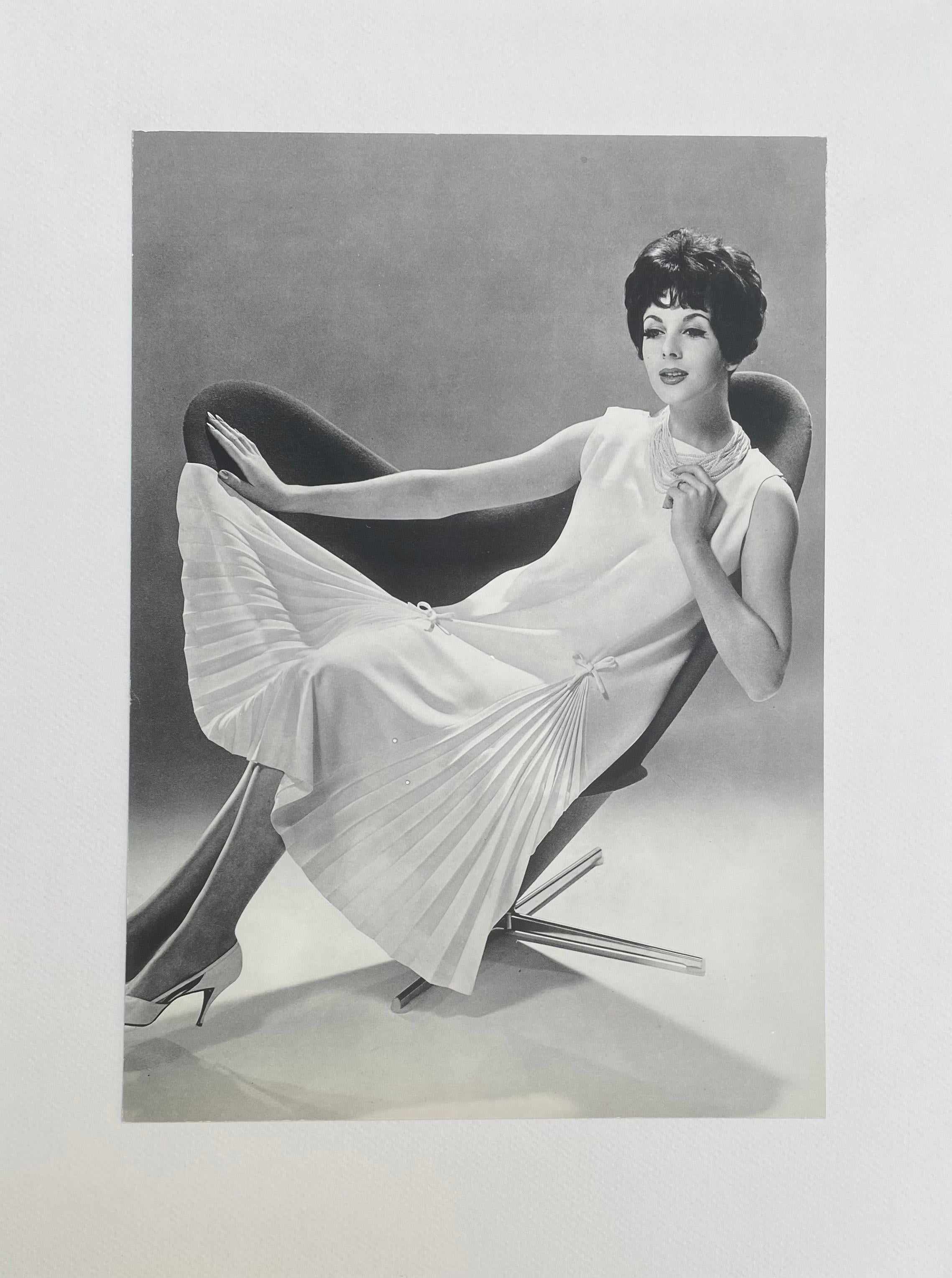 Seeberger - Fashion photography for Pierre Cardin
Seat by Verner Panton 
Signed and dated on the back 
Original Print 
1961
Size with frame : 42cm x 32cm 
Size unframed : 32cm x 23cm
190€