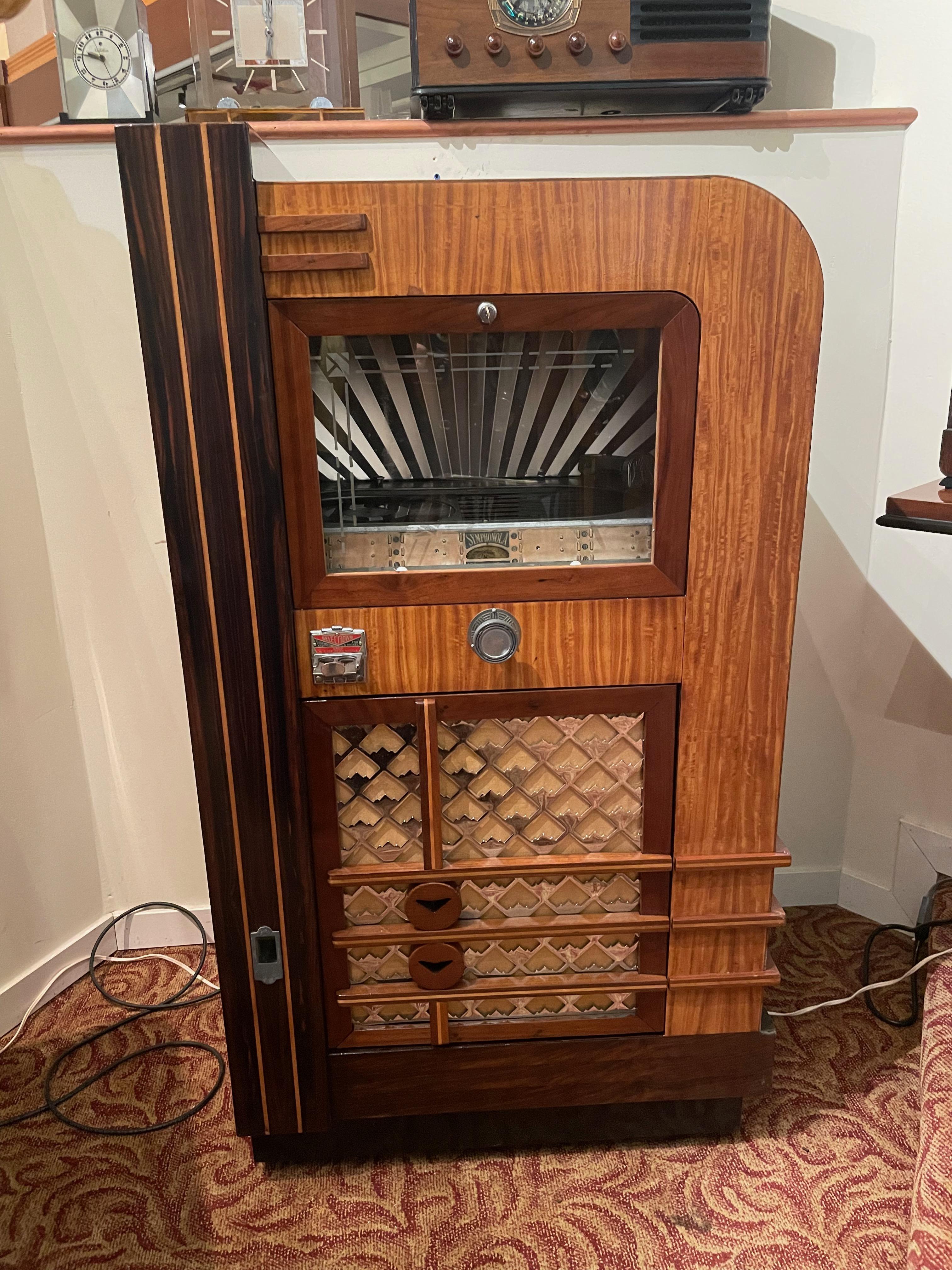 Seeburg Symphonola model C 1936 restored juke box. This is a rare and hard-to-find Modernistic Model which plays 12 78 RPM records. The Model C was considered one of, if not The most Art Deco Box ever manufactured. Not much is known about these