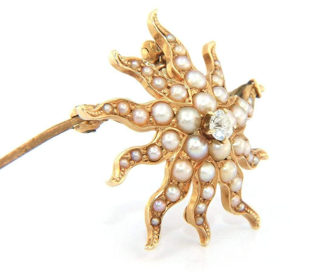 Seed Pearl Diamond Accent Sunburst Pendant/Brooch in 14K

Seed Pearl Diamond Accent Sunburst Pendant/Brooch
14K Yellow Gold
Diamond Carat Weight: Approx. 0.08ct
Pendant/Brooch Dimensions: Approx. 22.8 X 22.8 MM
Weight: Approx. 3.20 Grams
Stamped: