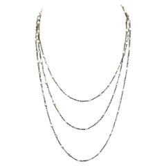 Seed Pearl Diamond Platinum 52" long Necklace