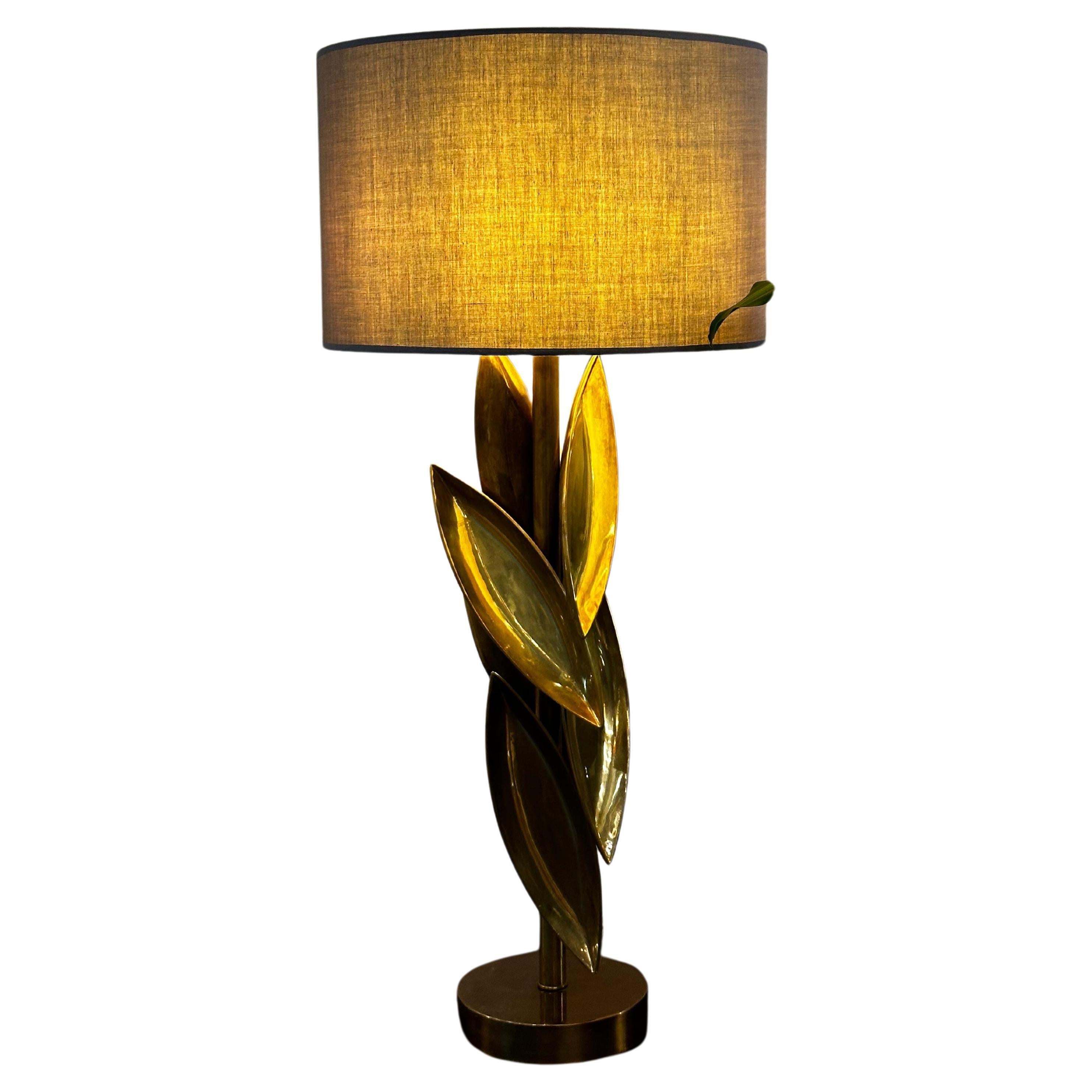 lluminate your space with the captivating charm of SEED Table Lamp, a manifestation of nature-inspired design seamlessly blending with contemporary elegance. Crafted with precision, this exceptional table lamp is composed of a single brass pipe