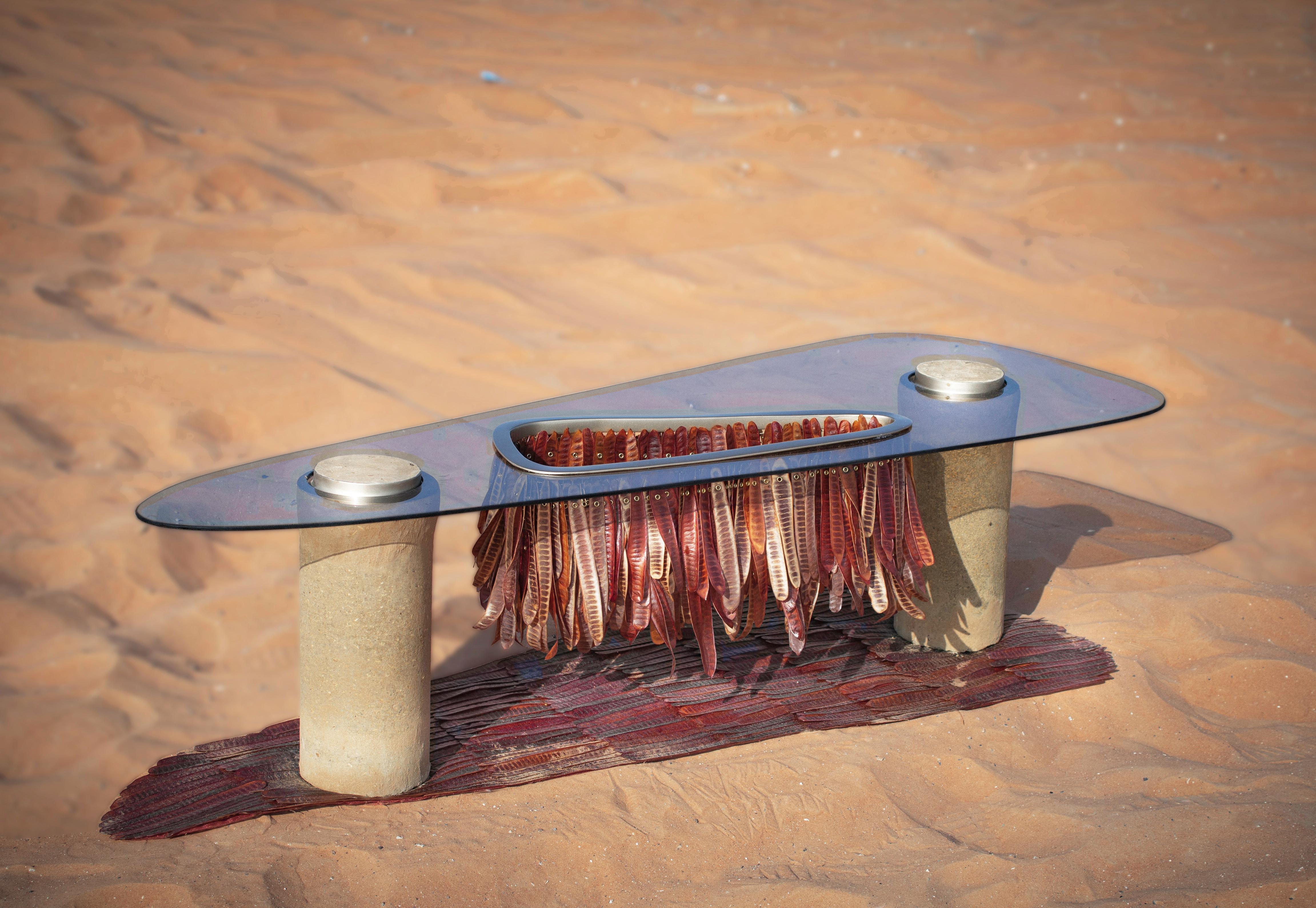 Seeds middle table by Nuhayr
Limited Edition Collection 
Dimensions: W 56 x L 154 x H 42cm
Materials: Lauceana, aluminium, steel, Belgian reflective glass-brown.
   