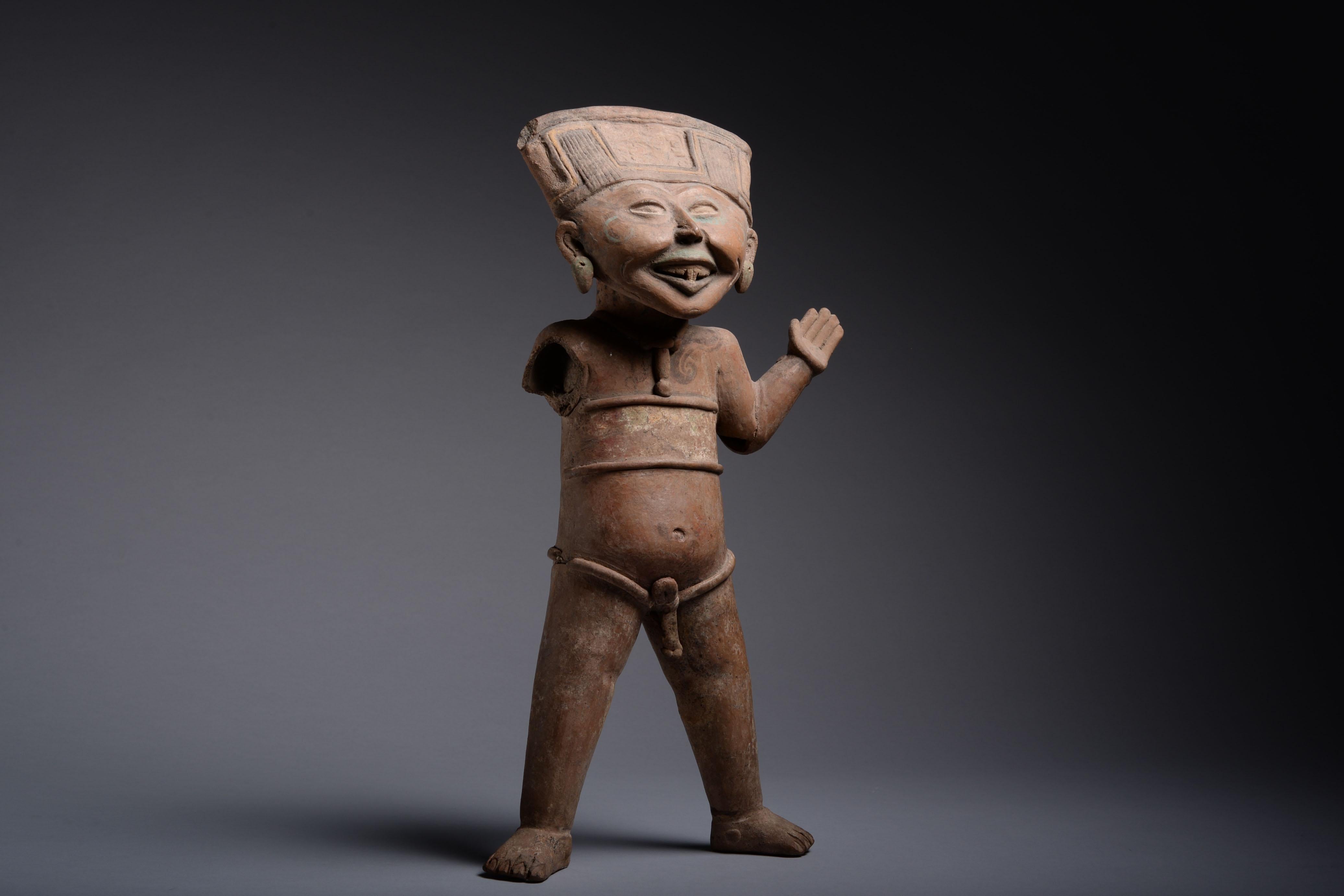 Pre-Columbian pottery laughing figure from the collection of Stanley Joseph Seeger (1930-2011). 

From Veracruz, Mexico, dating to 550-950 AD.

The art of ancient Mexico seems to belong to a world apart, and the enigmatic smiling figures of