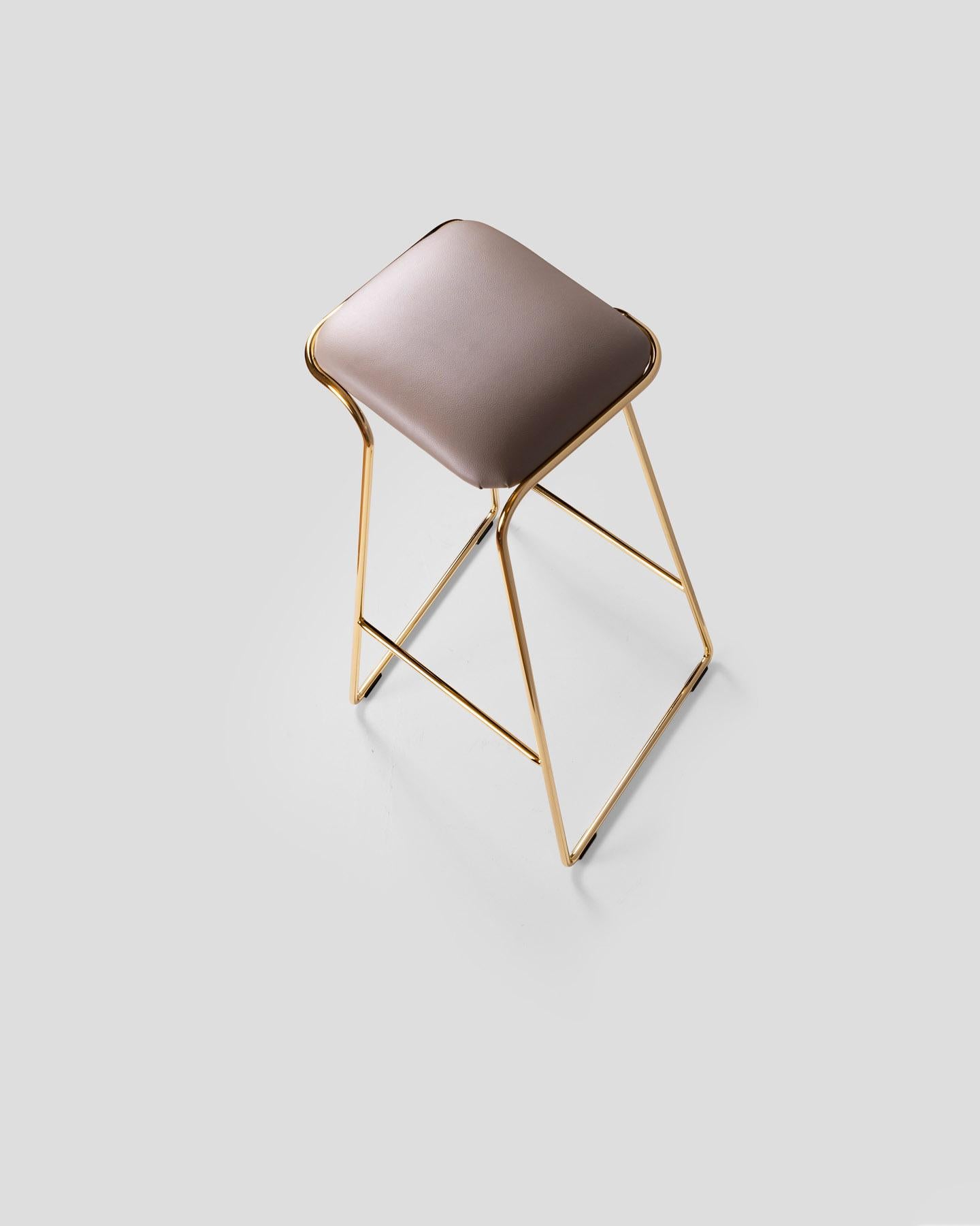 Seems Aureo Stool by GIROTTI ENRICO
Dimensions: W 42 x D 42 x H 75 cm
Materials: Steel, Upholstery.
Weight: 5 Kg. 

Enrico Girotti is an industrial designer who has found in the word “maker” his most authentic form of expression. Graduated in
