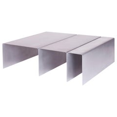 Mesa de centro SEGMENT de aluminio pulido by Estudio Persona