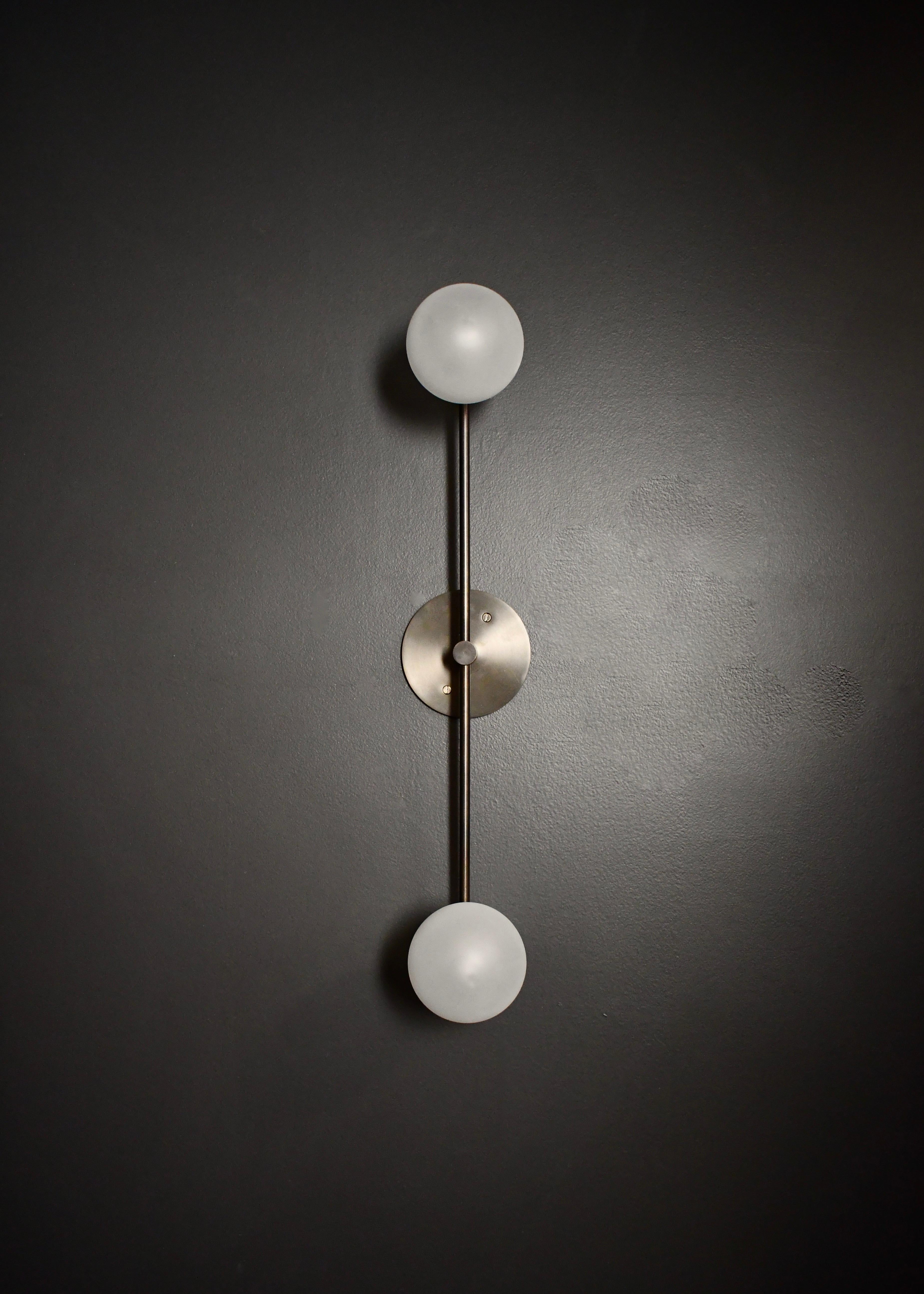 Segment wall lamp or flushmount ceiling fixture by Blueprint Lighting, 2020.
A handsome study in clean lines and simple form inspired by the tenets of the Bauhaus, Segment is truly a go-anywhere design and is equally at home in residential,