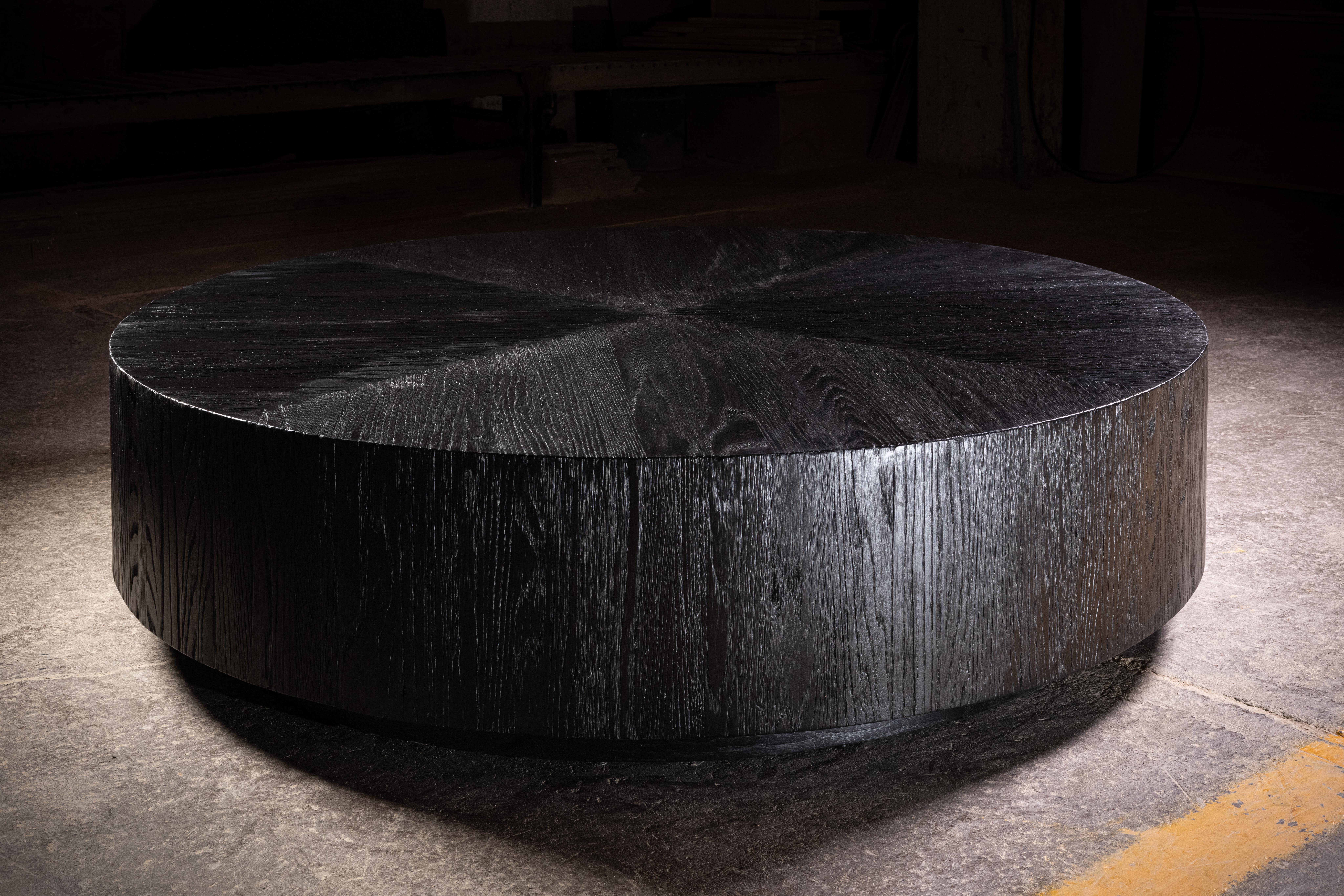 Segmented Round Coffee Table in Black Solid Oak by No Age Studio
Dimensions: Ø 121.9 x H 40.6 cm. 
Materials: Oak. 

No Age Studio - Handcrafted Furniture

Every piece we create is made to order, crafted with care and precision to meet your specific