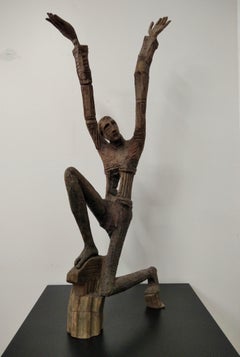 S'asseoir avec les mains en l'air
