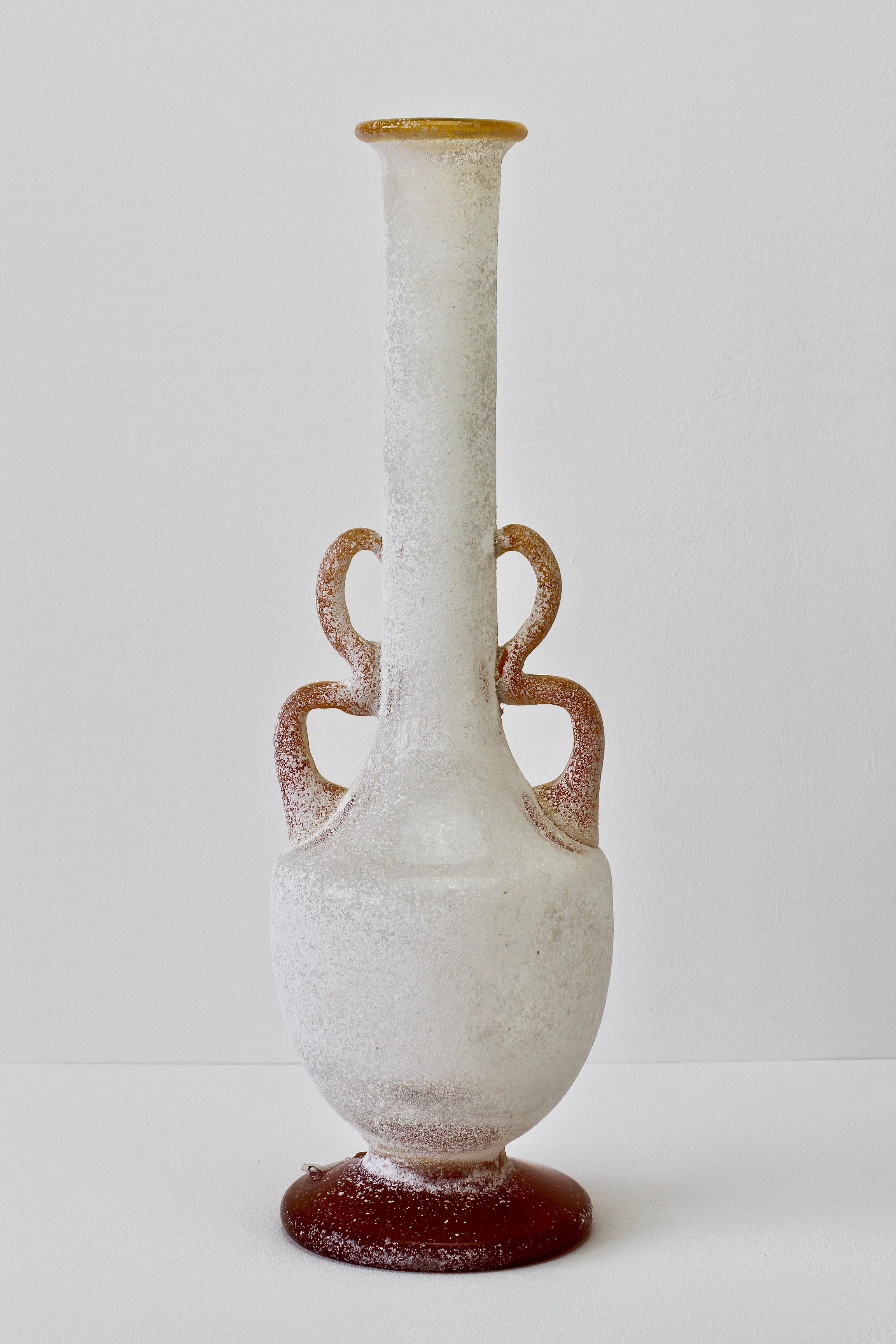 Large, long 'pencil' necked 'a Scavo' amber and white colored / coloured glass vase or vessel by Seguso Vetri d'Arte Murano, Italy. Elegant in form and showing extraordinary craftsmanship with the use of the 'Scavo' technique to replicate to look