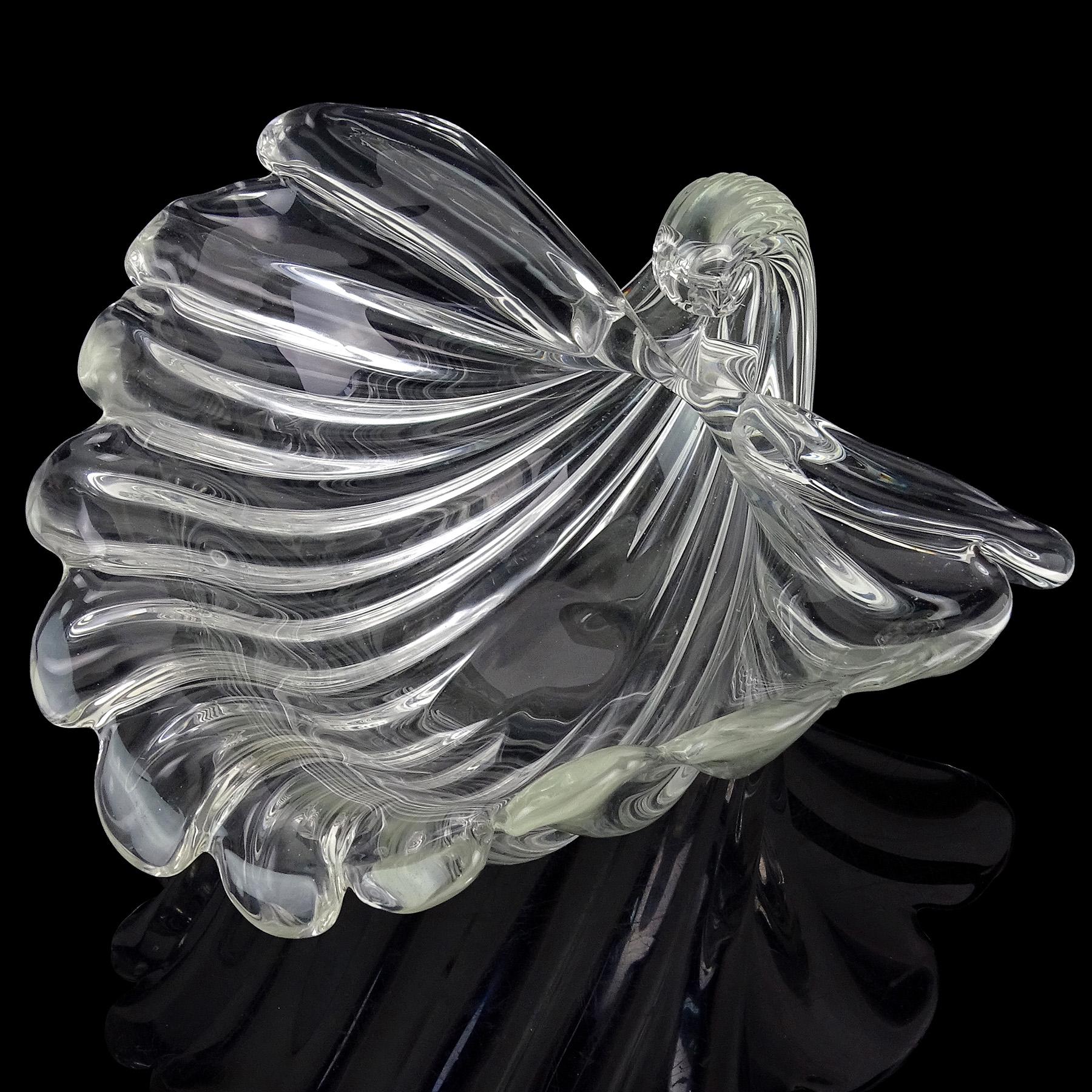 Beautiful vintage Murano hand blown crystal clear Italian art glass ribbed decorative seashell shape centerpiece bowl. The design is documented to designer Archimede Seguso, and this has been created for 