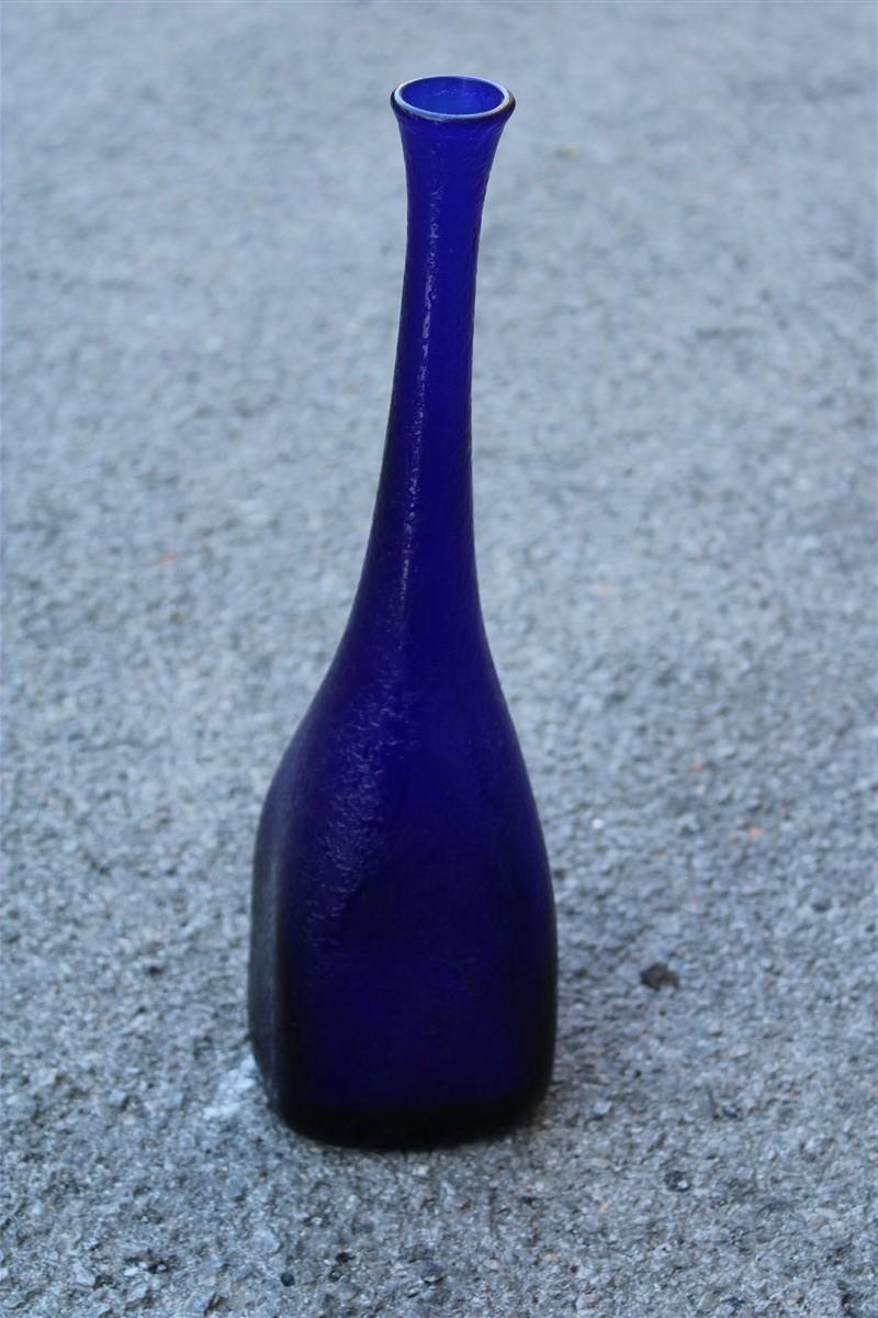 Seguso corroded cobalt blue vase in the shape of a bottle, 1960s.