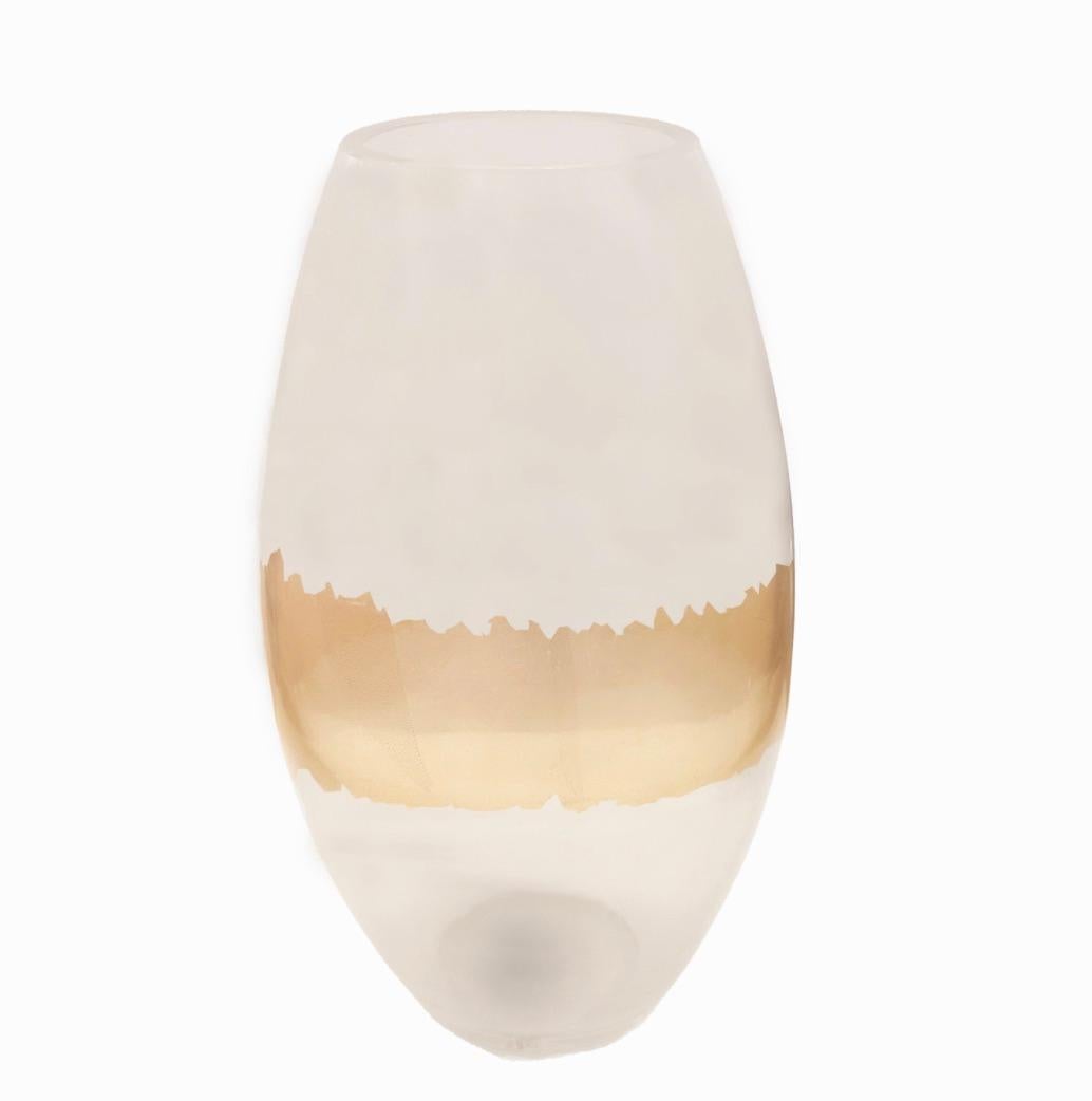 Exquisitely crafted Murano Glass Vase, by renowned glass maker Seguso. This hand-blown vase features an elegant elliptical shape and a striking band of gold leaf around its center. The finest of art glass, this piece carries the Seguso label and