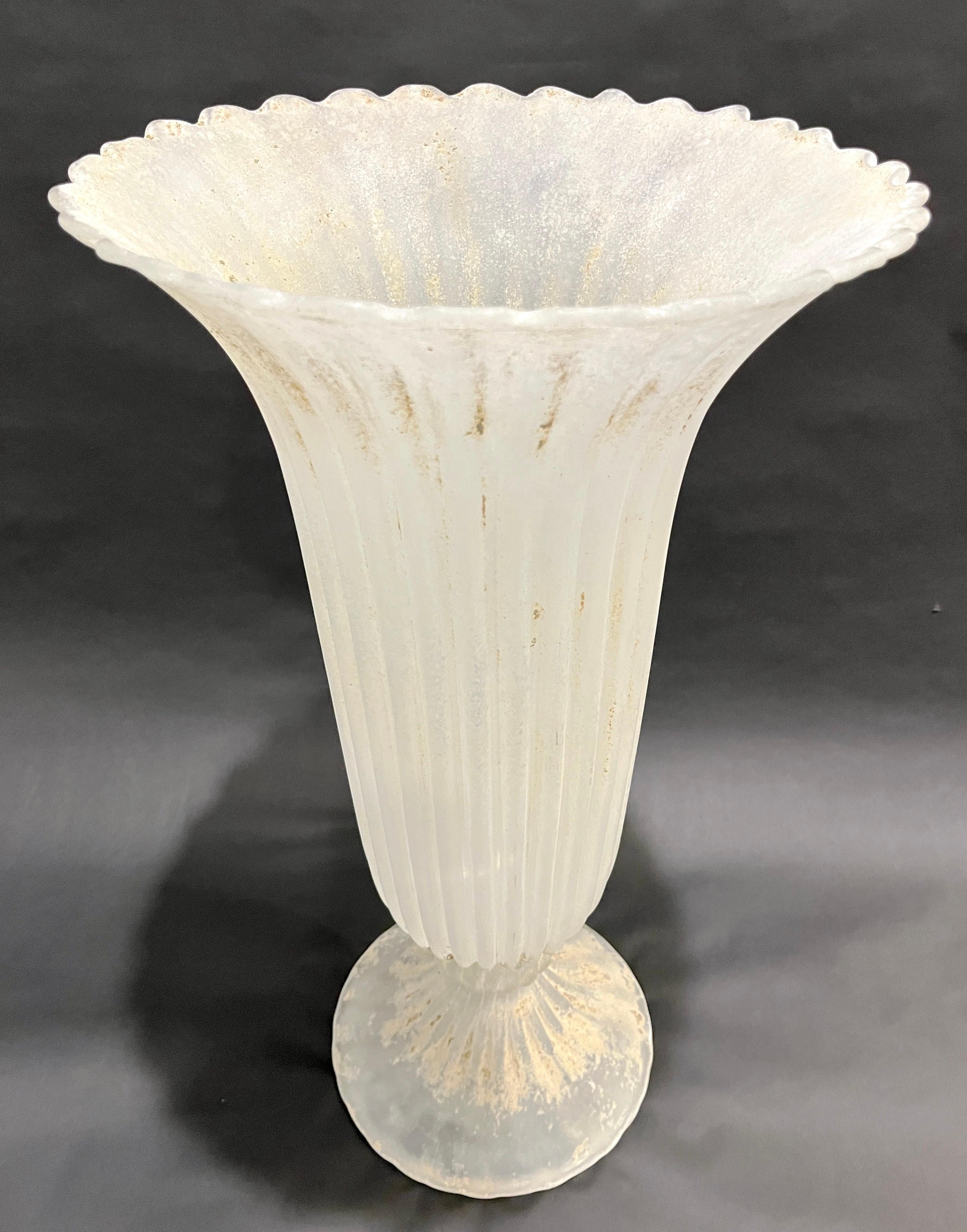 A rare Italian mid-century modern organic Murano glass elegant tall vase, with a Florentine neoclassical shape, by Seguso, precious because worked with an exceptional Scavo technique that gives an unusual stone antique look as if the piece had been