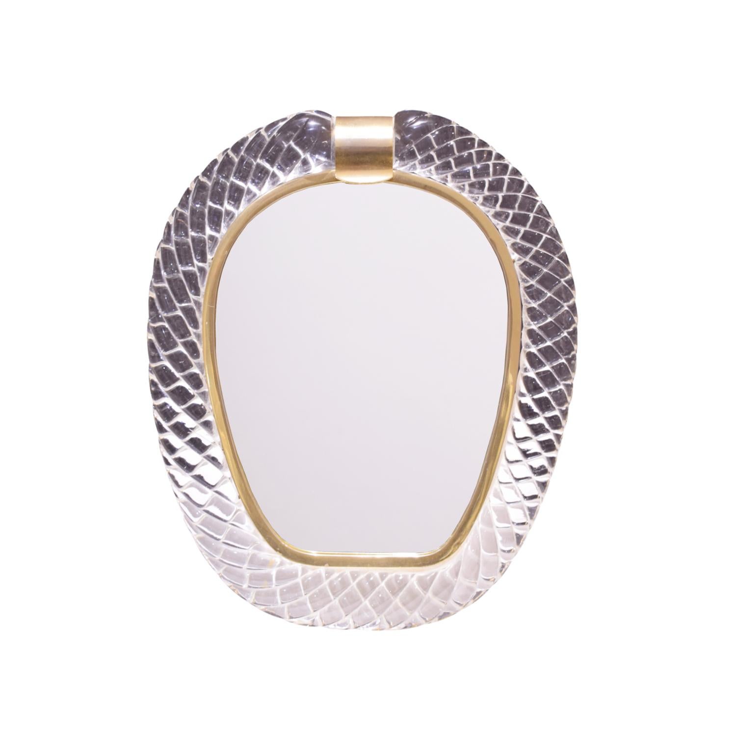 Large hand blown glass vanity mirror with brass accents by Seguso Vetri D’Arte, Murano Italy, 1981 (signed S.V.d ‘A Albarelli 981 on bottom). This mirror is exquisite and beautifully made.
