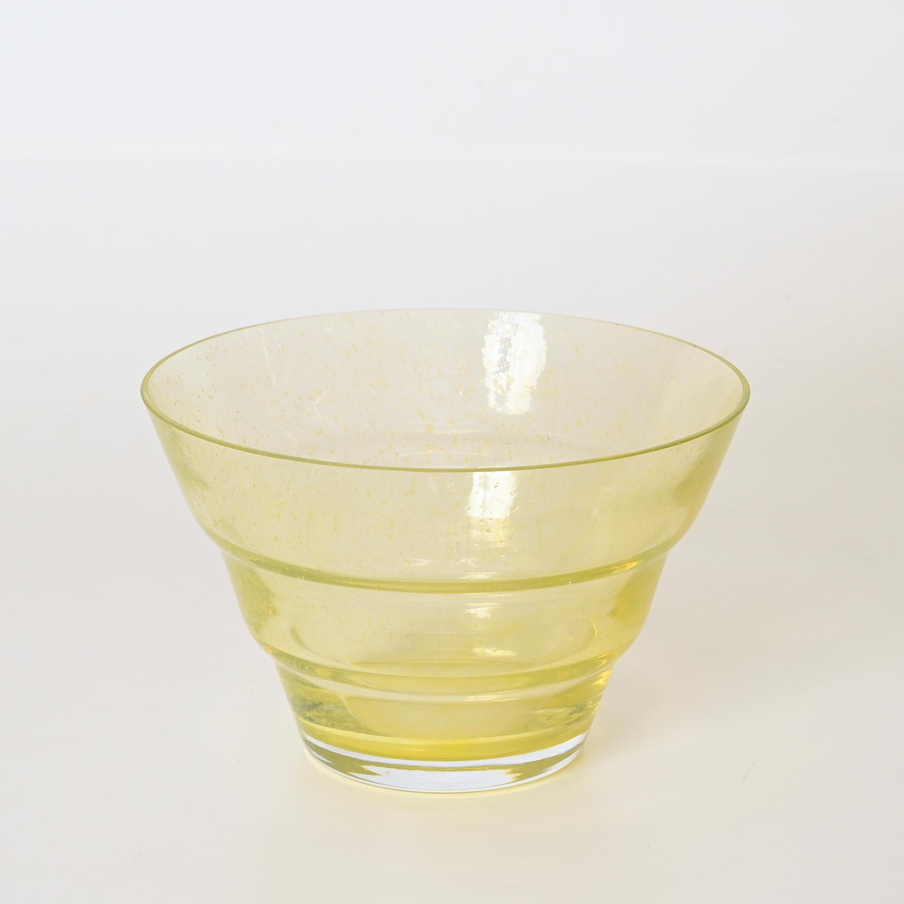 Elegant Murano hand-blown soft yellow glass bowl made using the 