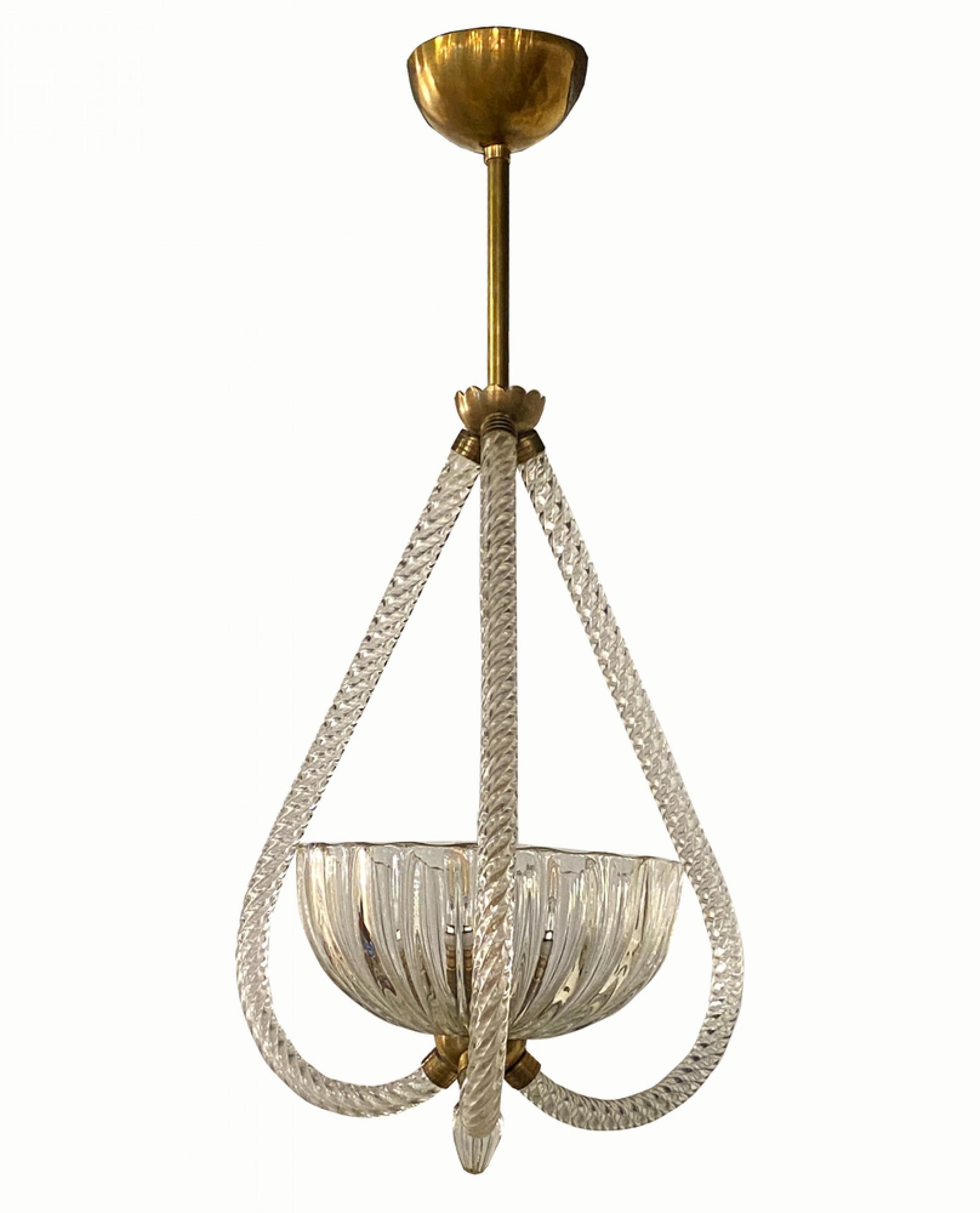 Midcentury Italian Modern chandelier with a central clear glass bowl with three blown glass supports connected to the underside of the central bowl connected to a brass fixture. (SEGUSO).