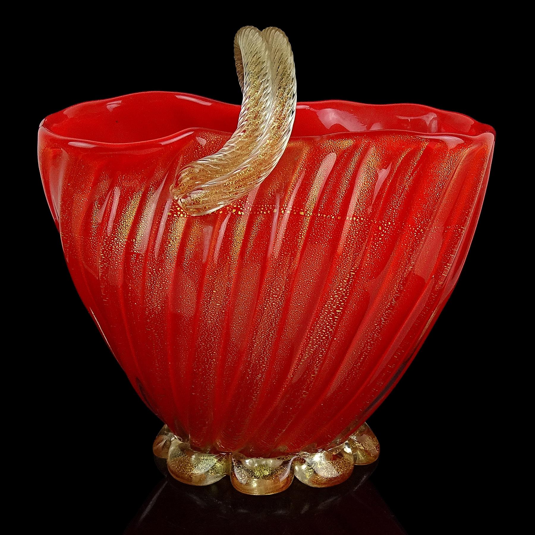 Rare and beautiful, large vintage Murano hand blown coral red and gold flecks Italian art glass flower basket / vase. Documented to designer Archimede Seguso, circa 1952. A similar piece (in yellow) was photographed by me, and published in the