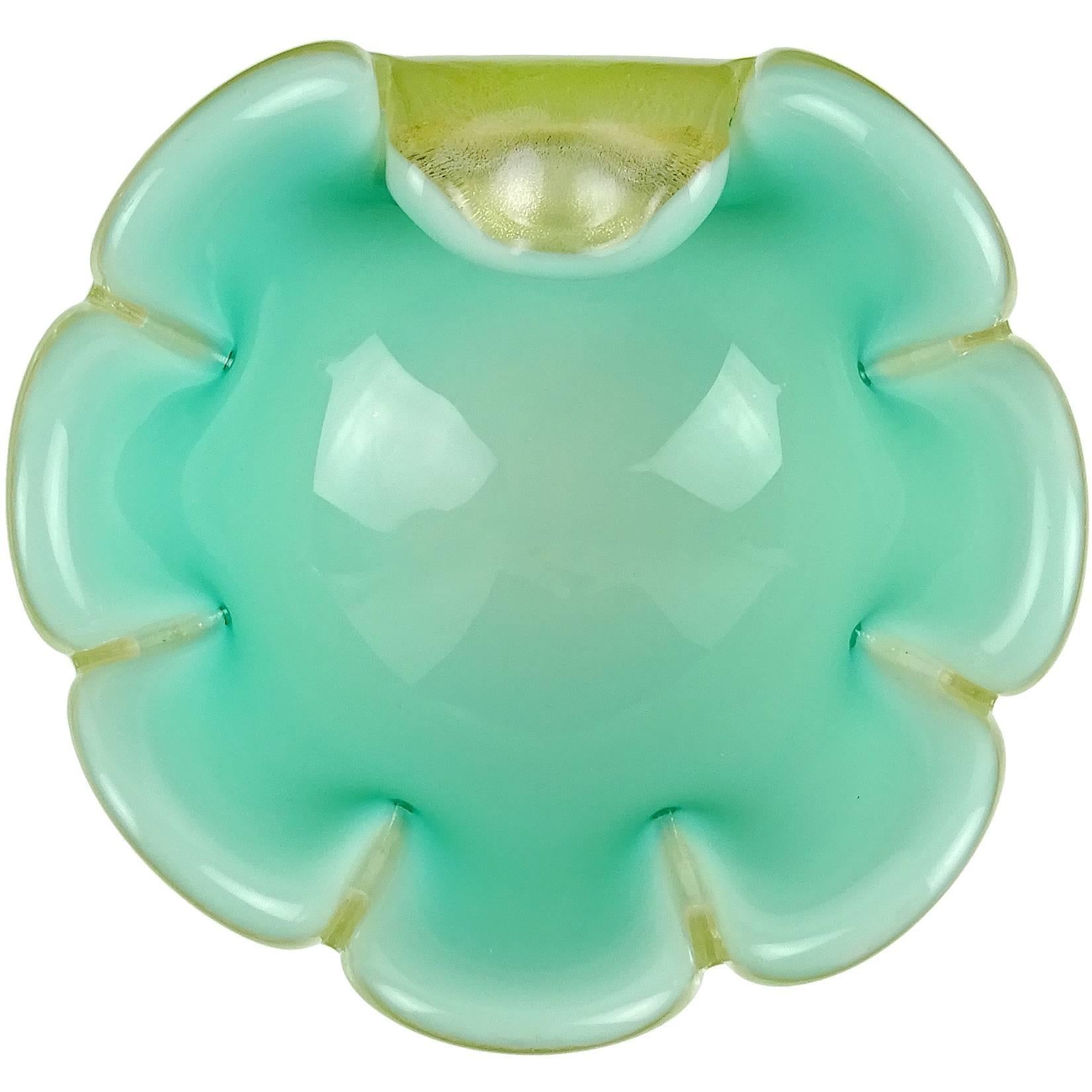 Priced per item (2 bowls available as shown). Beautiful vintage Murano hand blown white and gold flecks over aqua green / celadon Italian art glass scalloped rim bowl. Attributed to designer Archimede Seguso. It has a flower shape, with one petal
