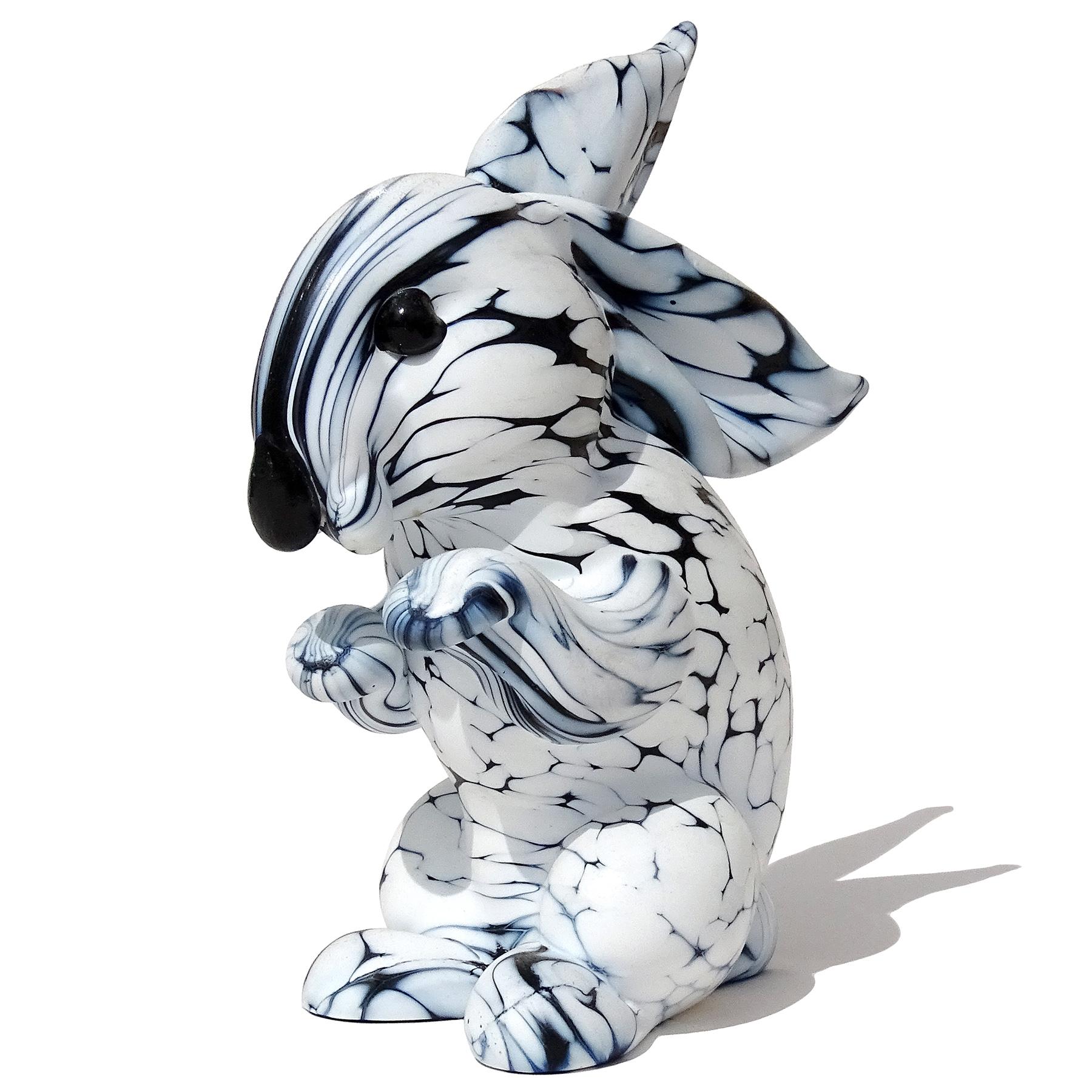 Beautiful vintage Murano hand blown black and white spotted Italian art glass bunny rabbit figurine sculpture. Documented to designer Archimede Seguso, from the 