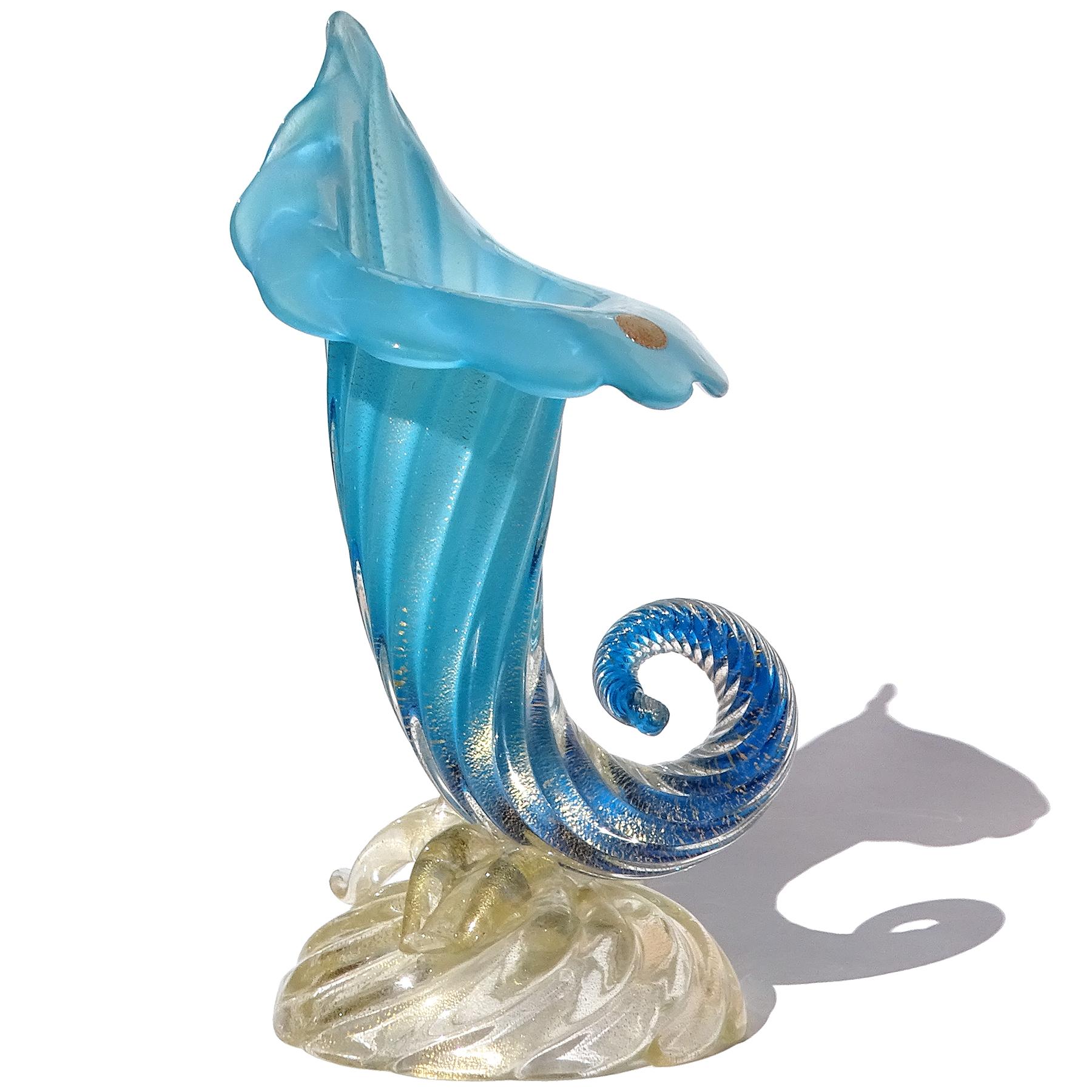 Elegant and large, vintage Murano hand blown opalescent blue and gold flecks Italian art glass cornucopia flower vase. Documented to designer Archimede Seguso, circa 1955. The vase design is published in his book (see info below). The piece also has