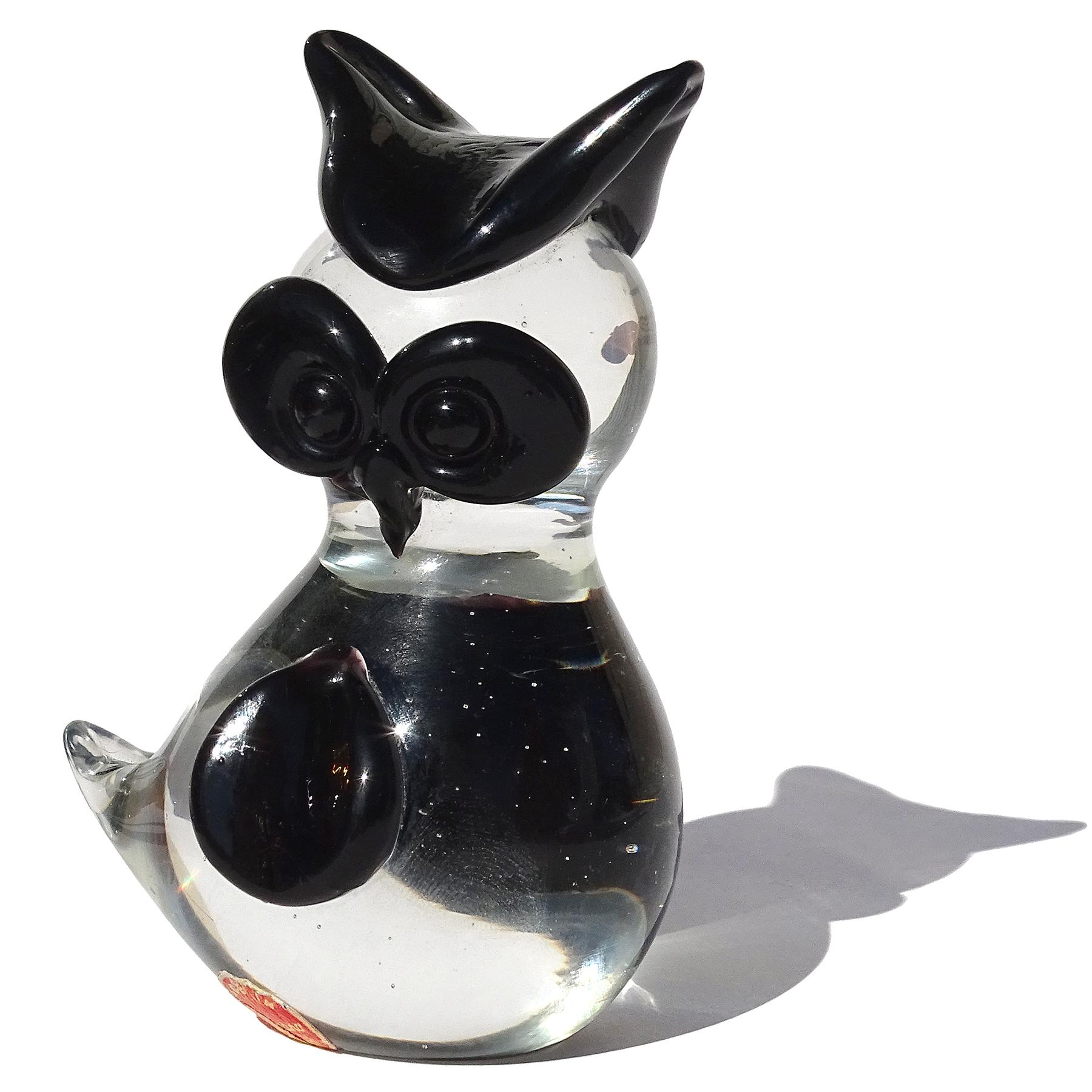 Beautiful vintage Murano hand blown clear crystal with black accents Italian art glass horned baby owl bird figurine, paperweight. Documented to designer Archimede Seguso. Similar ones are published in his book. The owl has applied big round eyes,