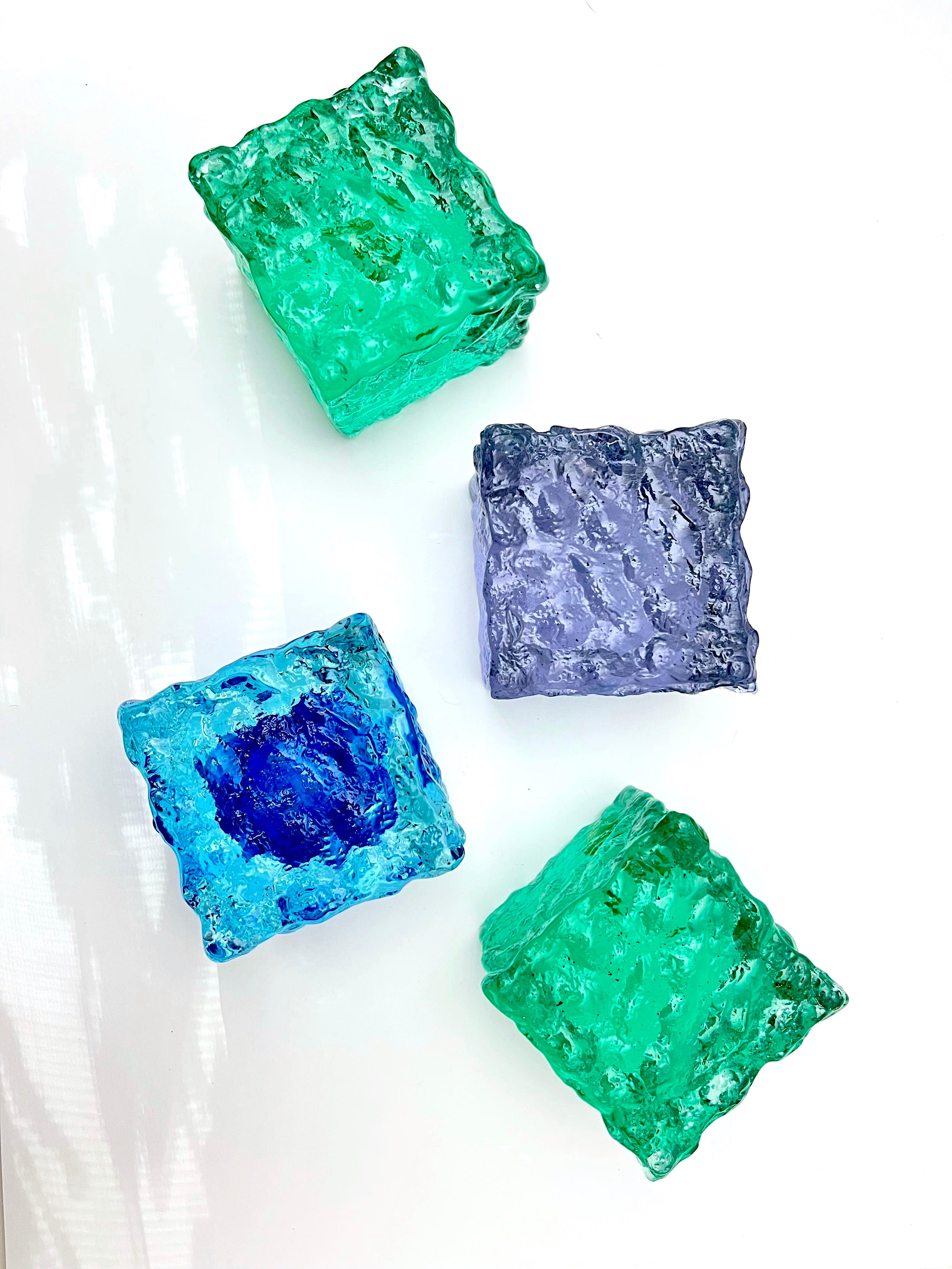A Rare Find! Stunning Set of Four Murano Seguso Chunky Glass Blocks, two green, one blue and one lavender.  No doubt done by Archimede Seguso the glass master and a great color palette to your eyes!
These are a perfect addition for any Murano
