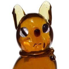 Italienische Seguso Murano-Kunstglas-Figur einer Katzenfigur aus goldenem Bernstein mit Goldflecken und Schleife