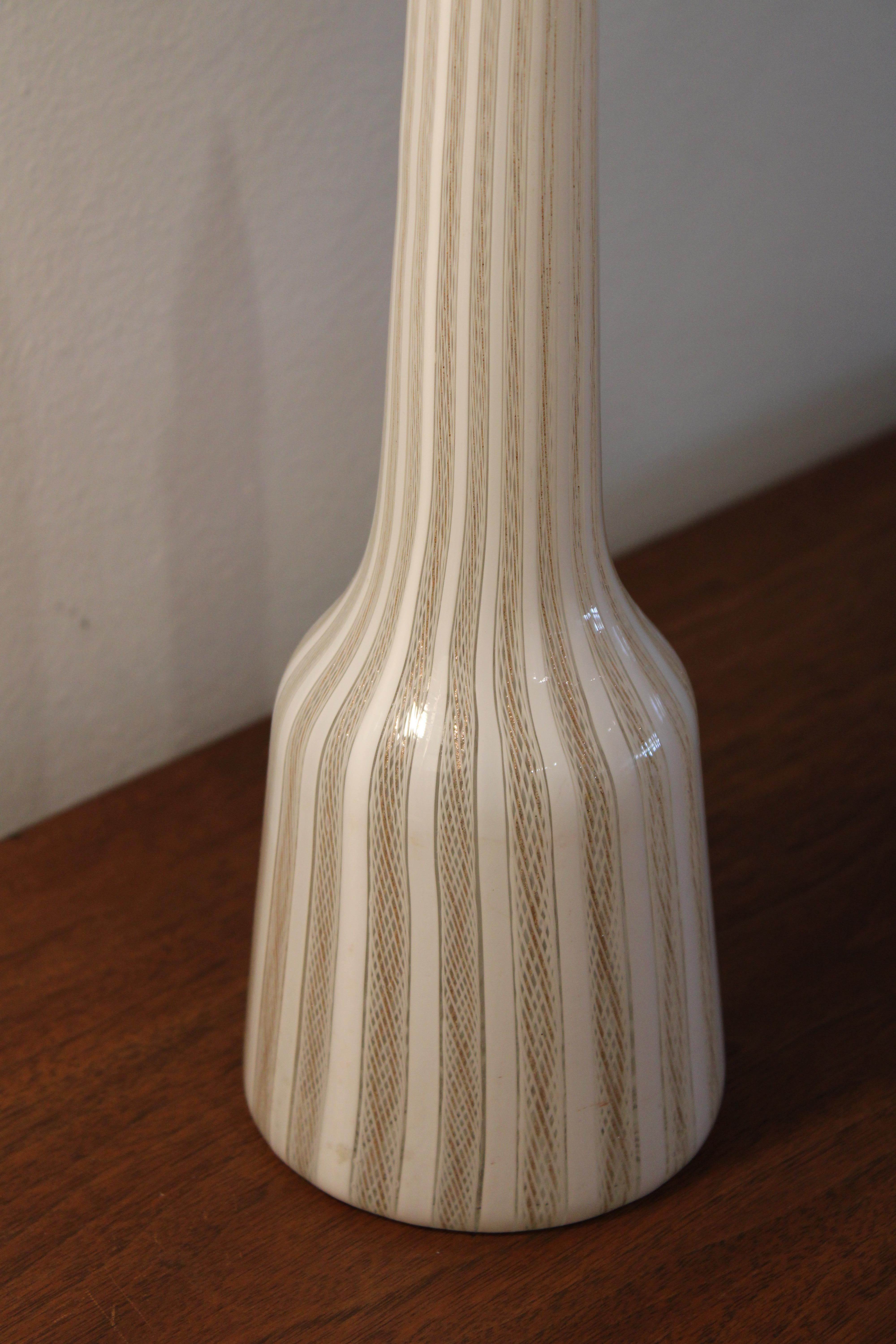 Latticino glass bottle/decanter by Seguso, White and clear glass with delicate metallic gold aventurine threads. Bottle measures 19.25