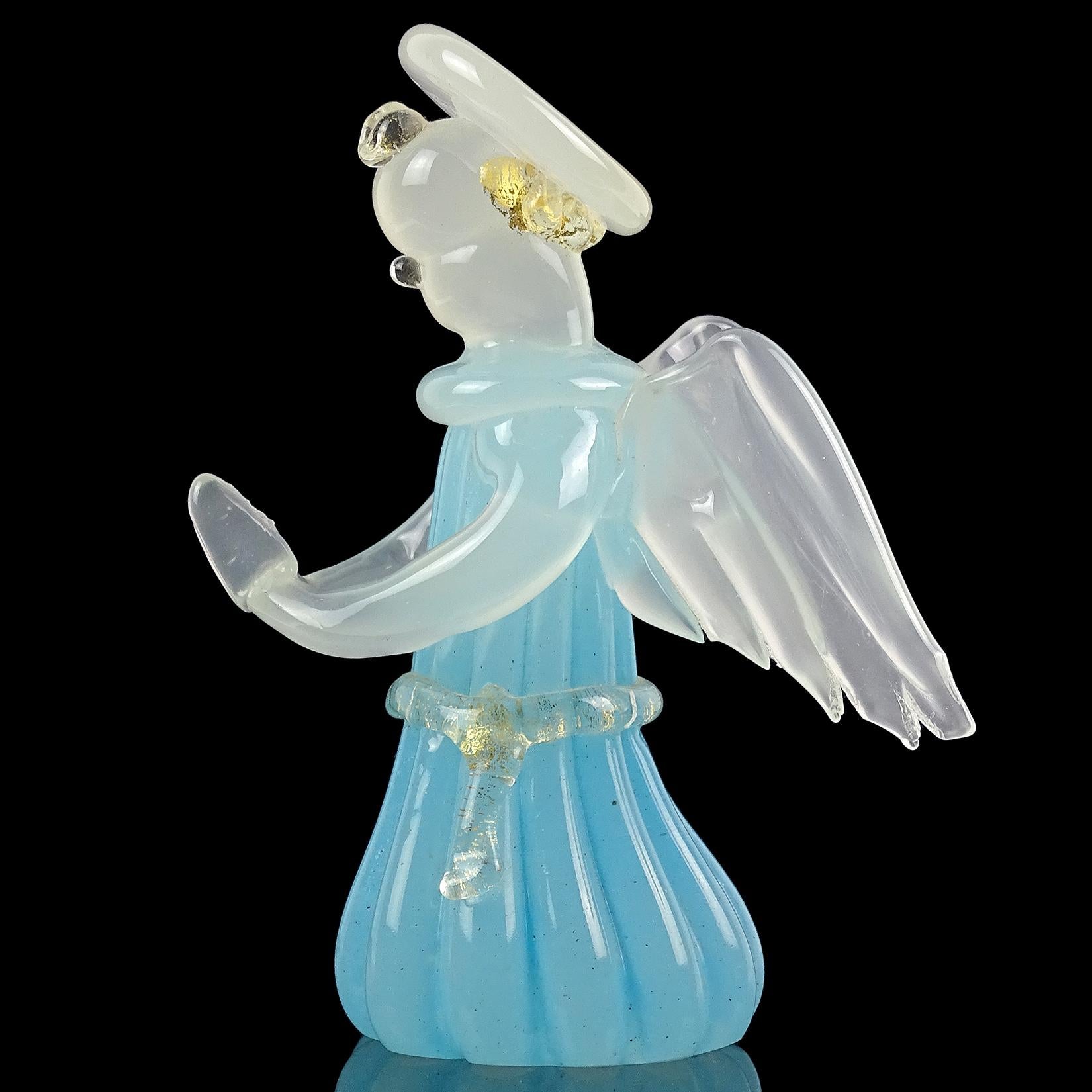 Beautiful vintage Murano hand blown opalescent white and blue, with gold flecks Italian art glass angel figurine. Documented to designer Archimede Seguso, from the 