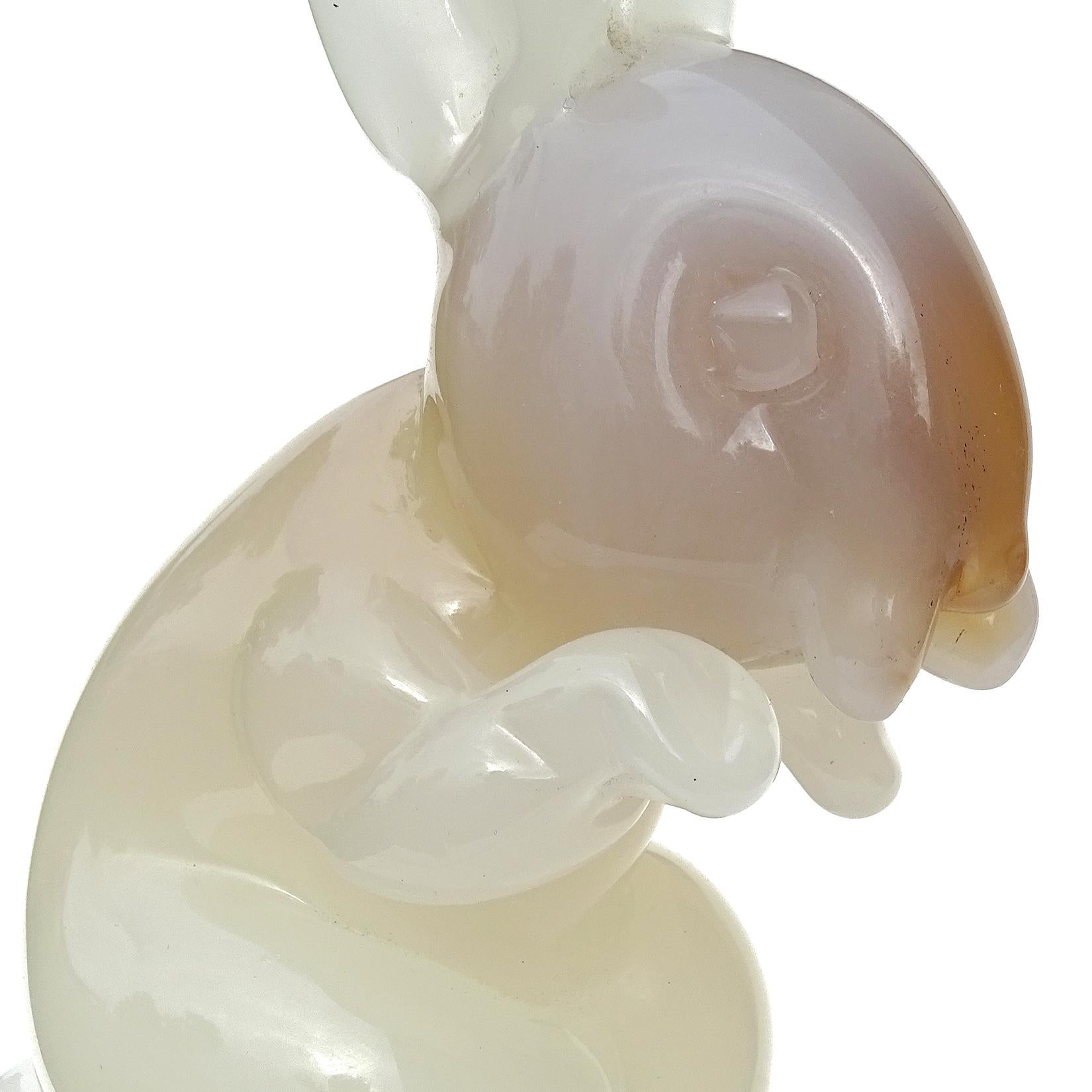 Beautiful vintage Murano hand blown opalescent white and caramel Italian art glass bunny rabbit sculpture / figurine. Documented to designer Archimede Seguso. It still retains a worn 