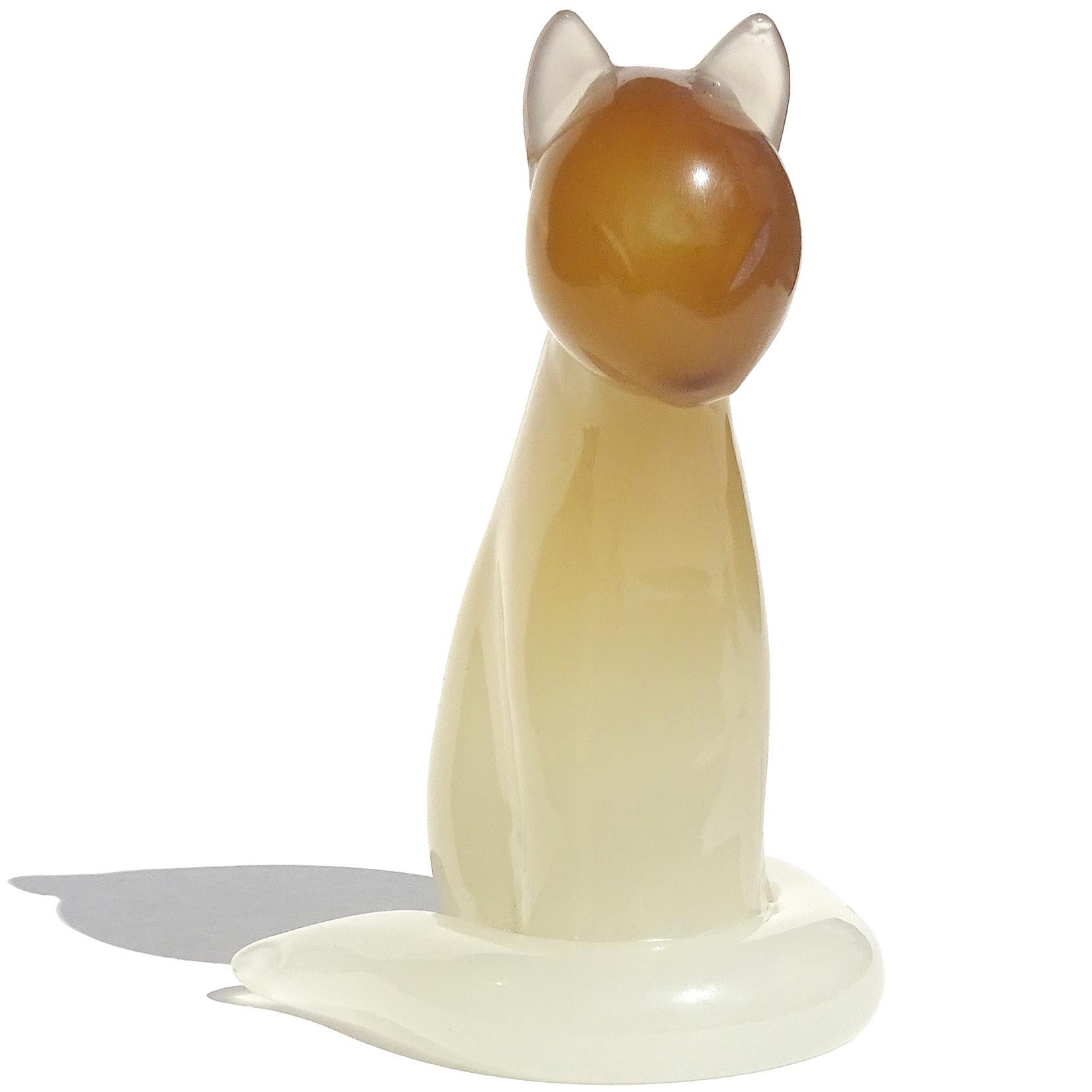 Beautiful vintage Murano handblown opalescent white and caramel Italian art glass kitty cat sculpture or figurine. Documented to designer Archimede Seguso. It still retains an 