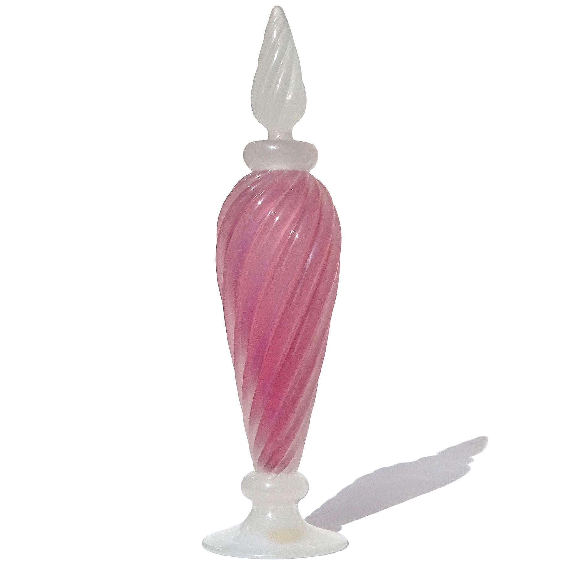 Beautiful vintage Murano hand blown opalescent pink and white Italian art glass vanity tall footed perfume bottle. Documented to designer Archimede Seguso. It has been created as part of the 