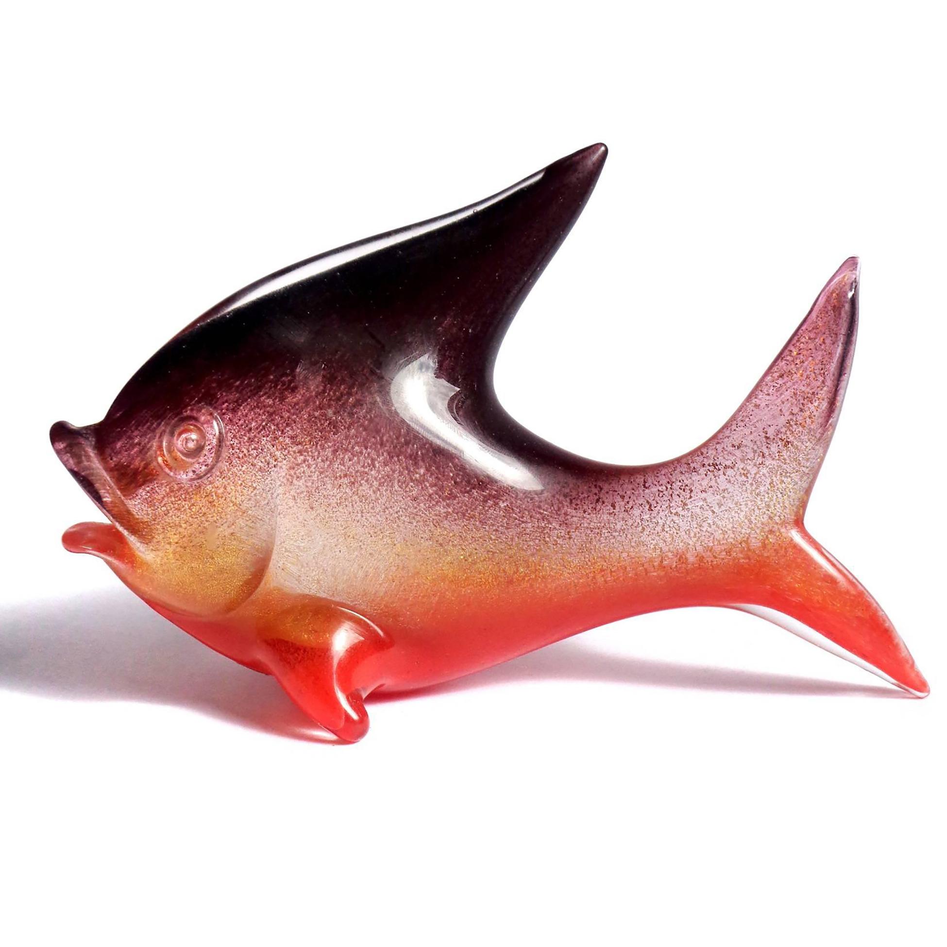 Beautiful vintage Murano hand blown bright red, dark purple and gold flecks Italian art glass fish sculpture. The piece is documented to designer Archimede Seguso. It is created in the 
