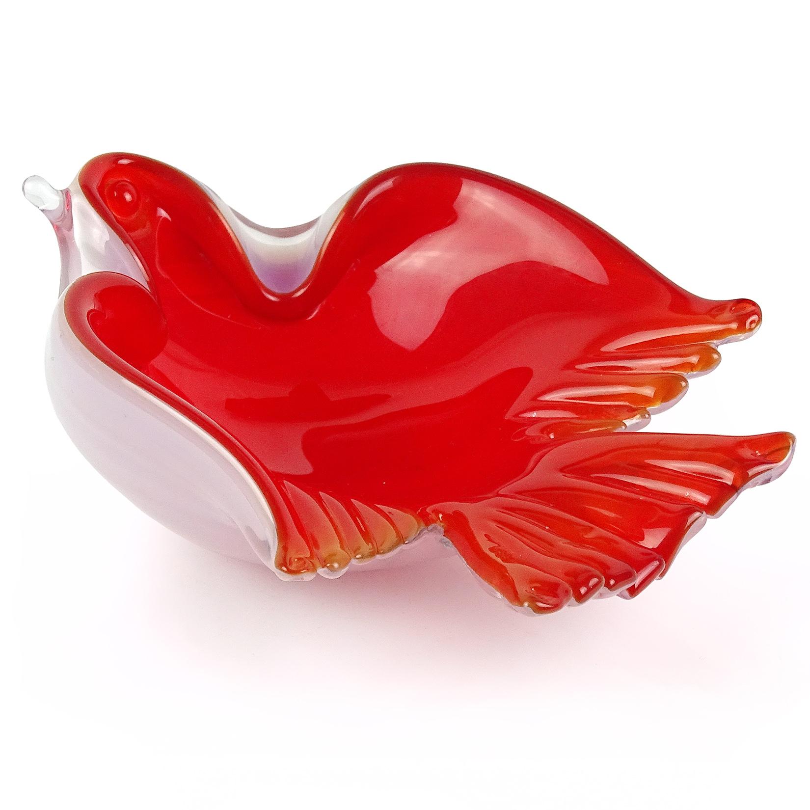 Beautiful Murano hand blown red and white opalescent Italian art glass flying bird shaped ring dish / bowl. Attributed to designer Archimede Seguso. The bowl nicely detailed, with crimped edges sculpted as bird wings and tail. Measures: 5 3/4