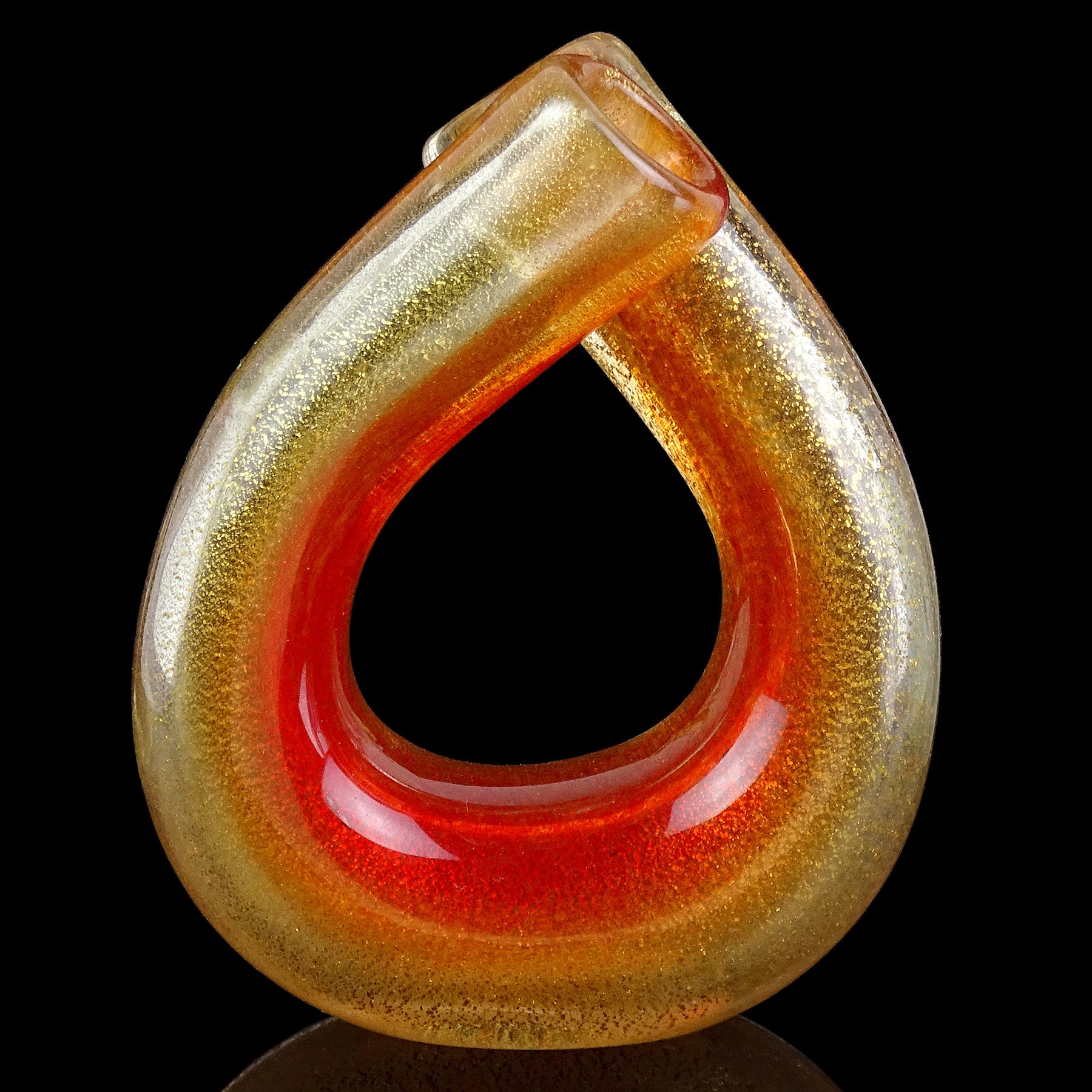 Beautiful and rare vintage Murano hand blown red-orange and gold flecks Italian art glass double spout flower vase. Documented to designer Archimede Seguso, and created in the 