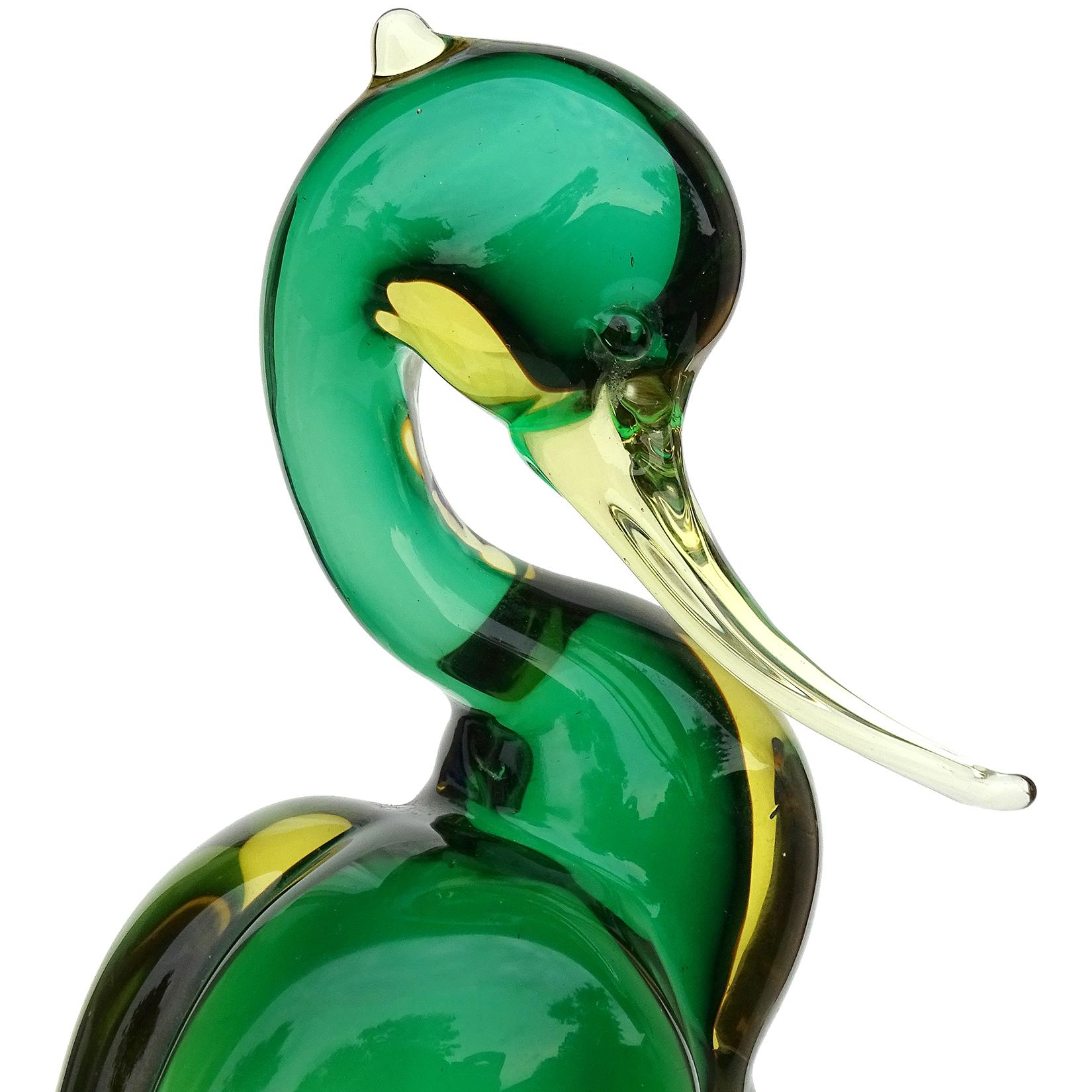 Beautiful tall vintage Murano hand blown Sommerso green to golden orange Italian art glass Heron bird sculpture. Documented to designer Archimede Seguso circa 1950s, with acid signed 