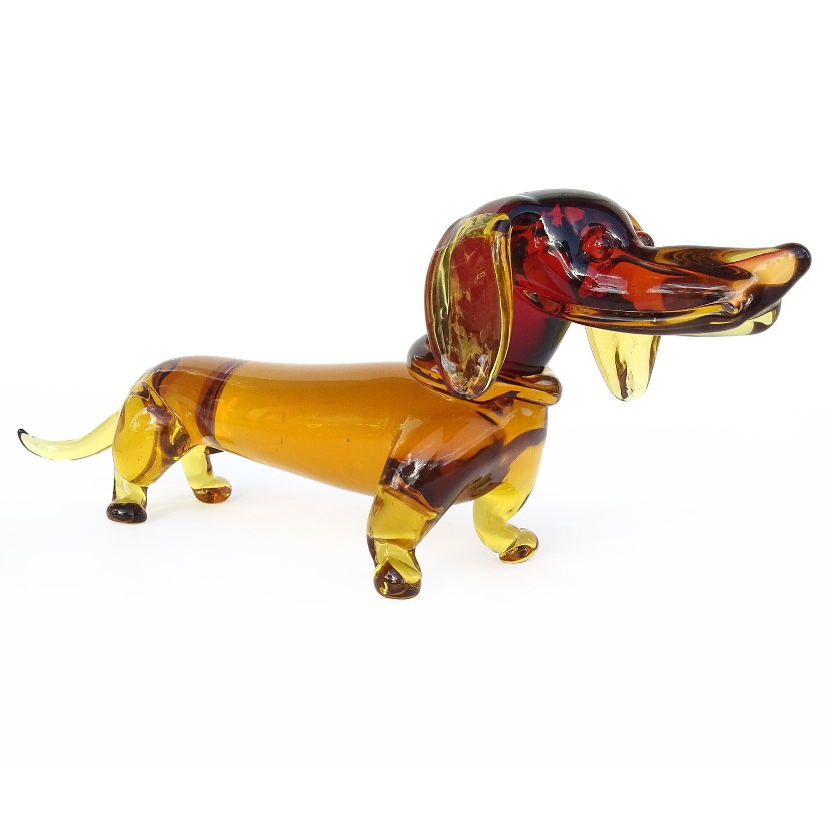 Beautiful and rare, large vintage Murano hand blown Sommerso red orange and golden honey colors Italian art glass Dachshund puppy dog sculpture. Documented to designer Archimede Seguso, with worn partial red 