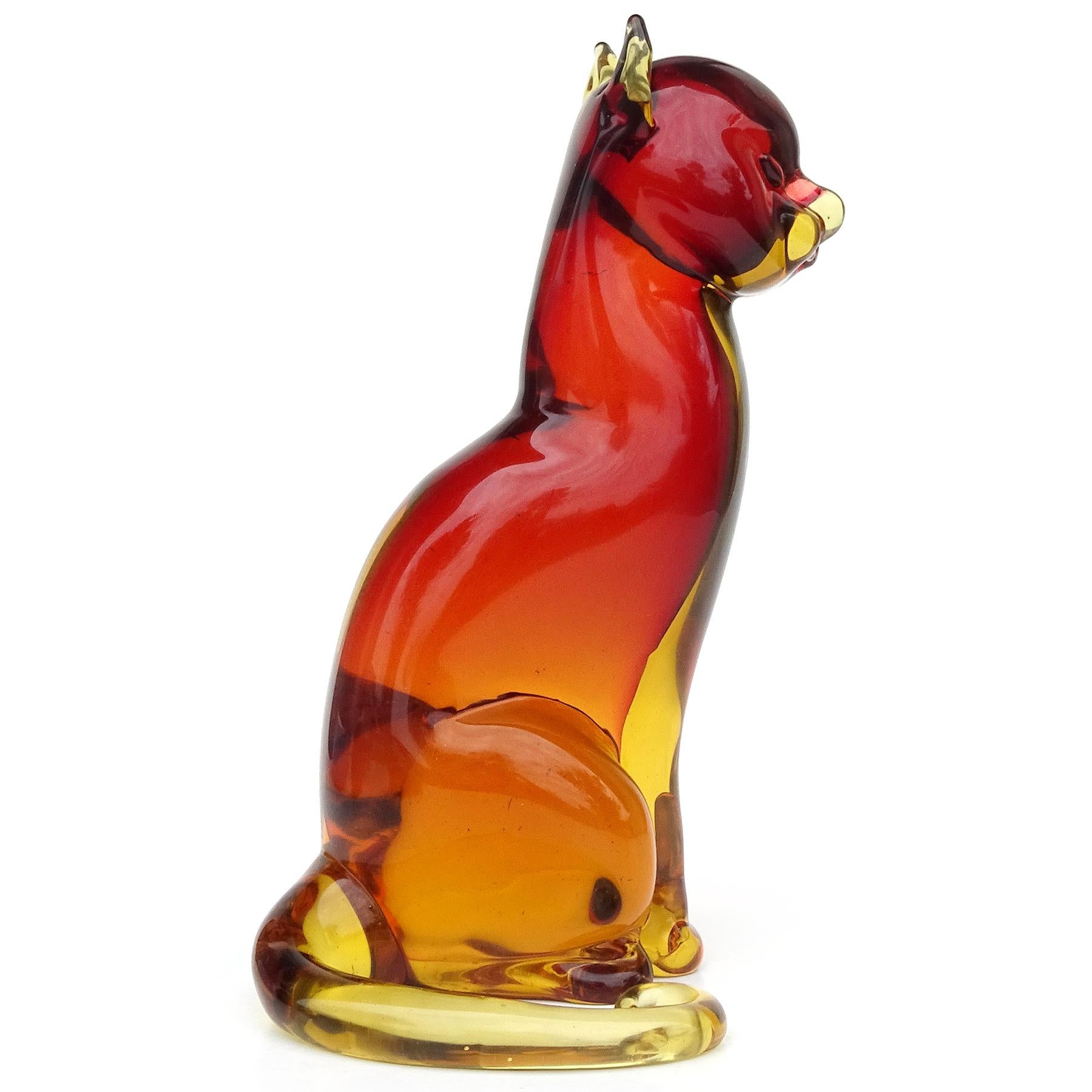 Beautiful and rare, vintage Murano hand blown Sommerso red orange and golden yellow honey color Italian art glass standing kitty cat sculpture. Documented to designer Archimede Seguso, with worn partial red 