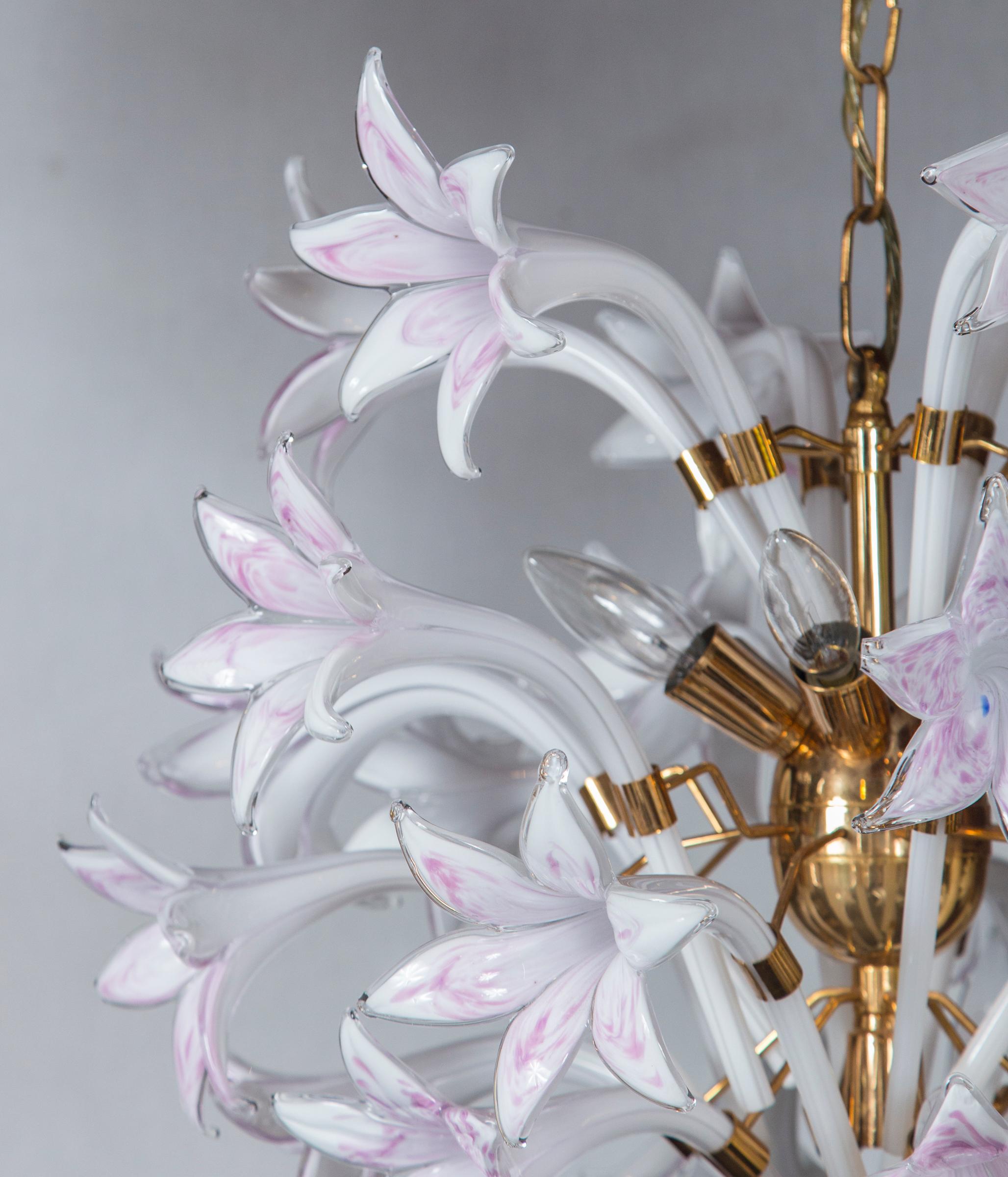 Seguso Murano Venetian glass style lily chandelier with three tiers and brass frame.