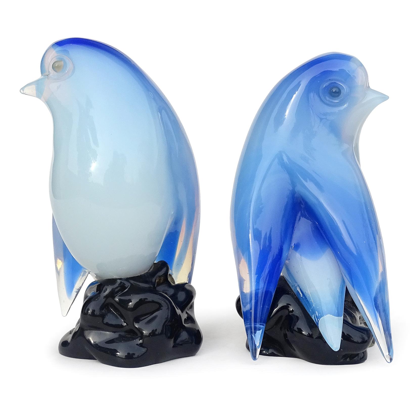 Priced per item (2 birds available). Beautiful vintage Murano hand blown, opalescent white and sky blue Italian art glass bird figurine / sculpture. Attributed to the Seguso Vetri d'Arte company, circa 1950s. The cute birds have gray eyes, and stand