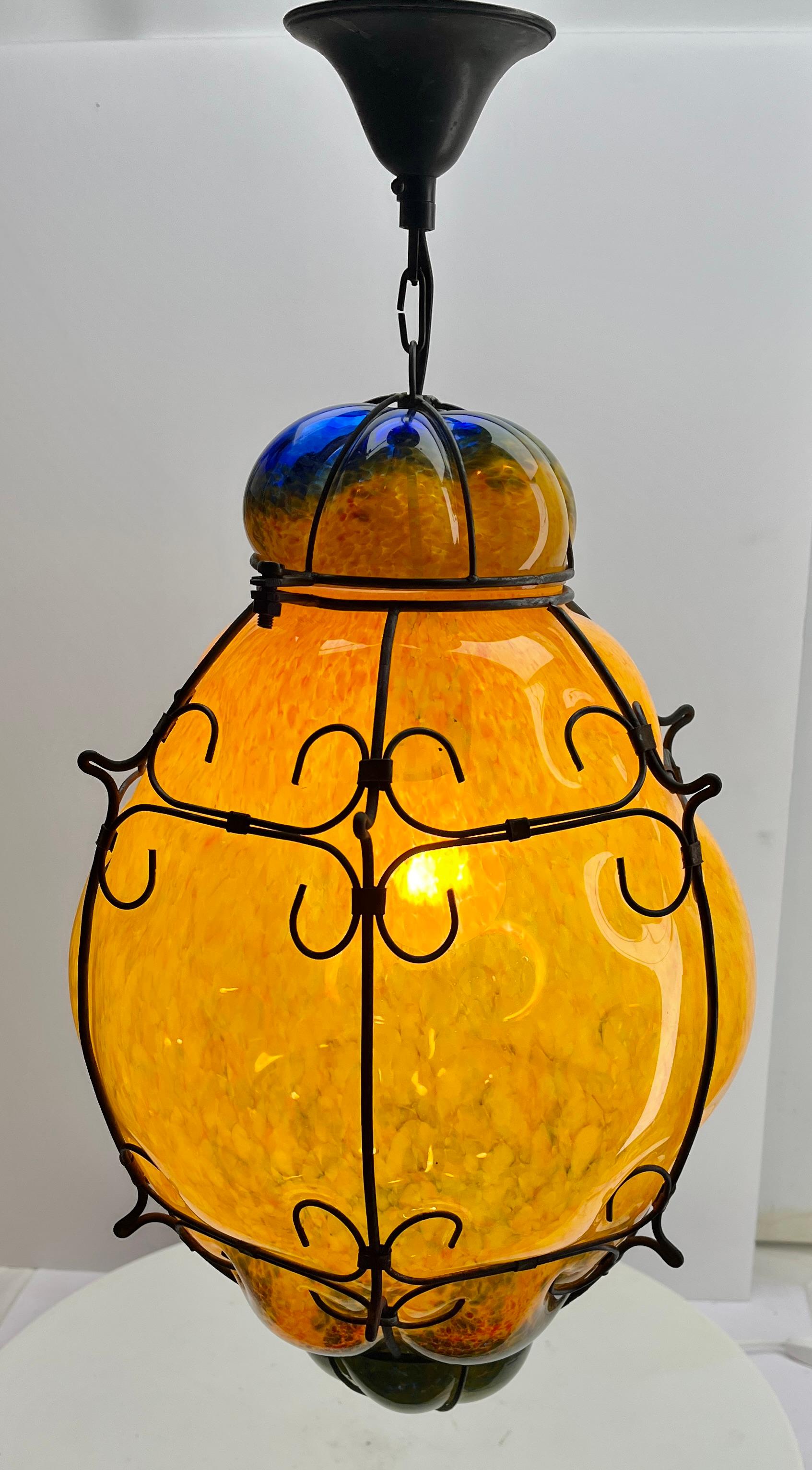 Seguso Pendant Lamp in Cage Murano Glass, 1950s
Italian Pendent Lamp Murano mouth-blown glass in cage fixture
Photography fails to capture the simple elegant illumination provided by this lamp.

Good distribution of darker and lighter shades.
A