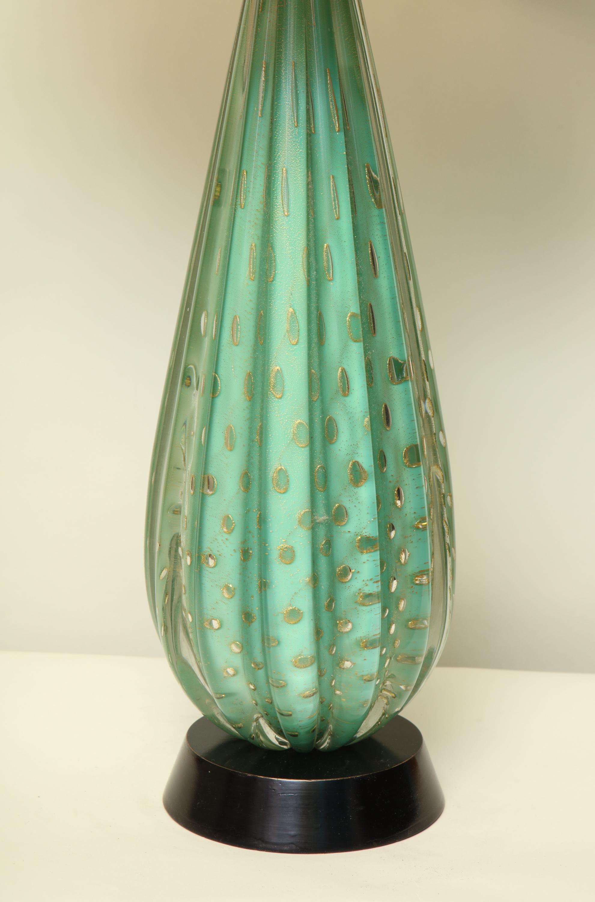 A Seguso table lamp Murano art glass green with gold inclusions black lacquer base new 3-way socket and rewired.
Shade not included.
