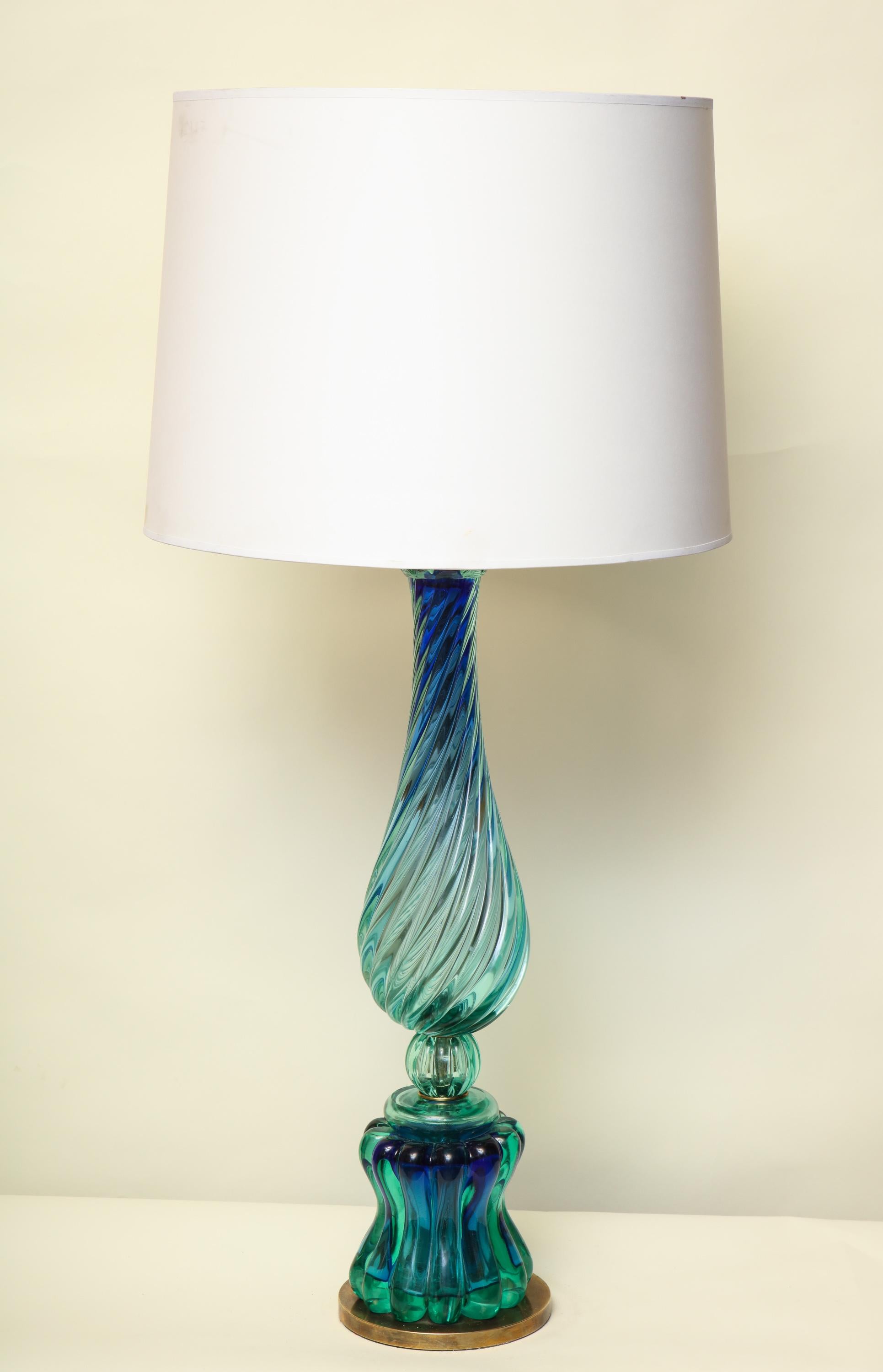 A Seguso table lamp Murano Art Glass radiant blue with patinated brass mounts Italy 1950s
New sockets and rewired
Shade included.