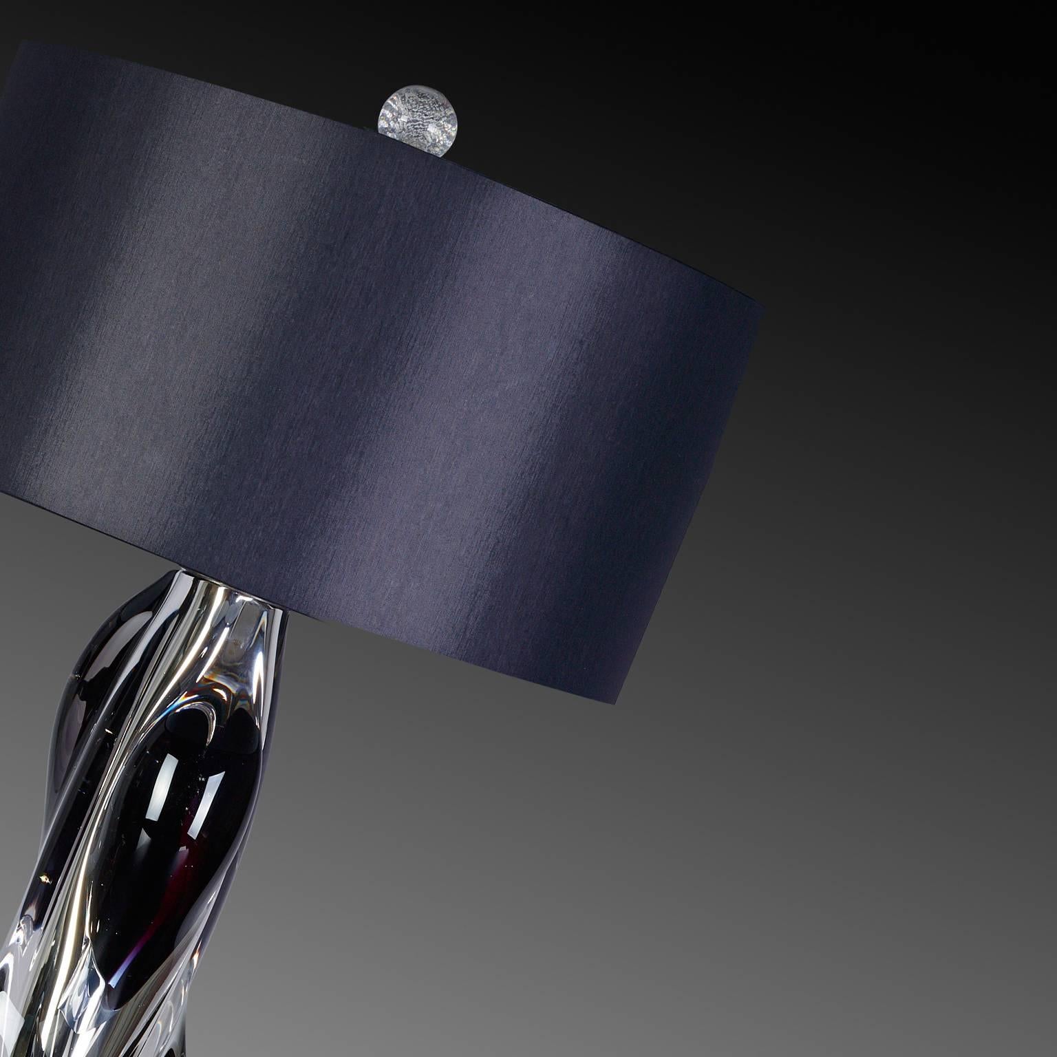 Barena Murano glass table lamp by Seguso Vetri d’Arte. Handmade, blown Murano glass lamp with a sculptural and organic shape. The lamp's clear and mirrored glass is accented by small inclusions of black glass, which give the lamp a modern and unique