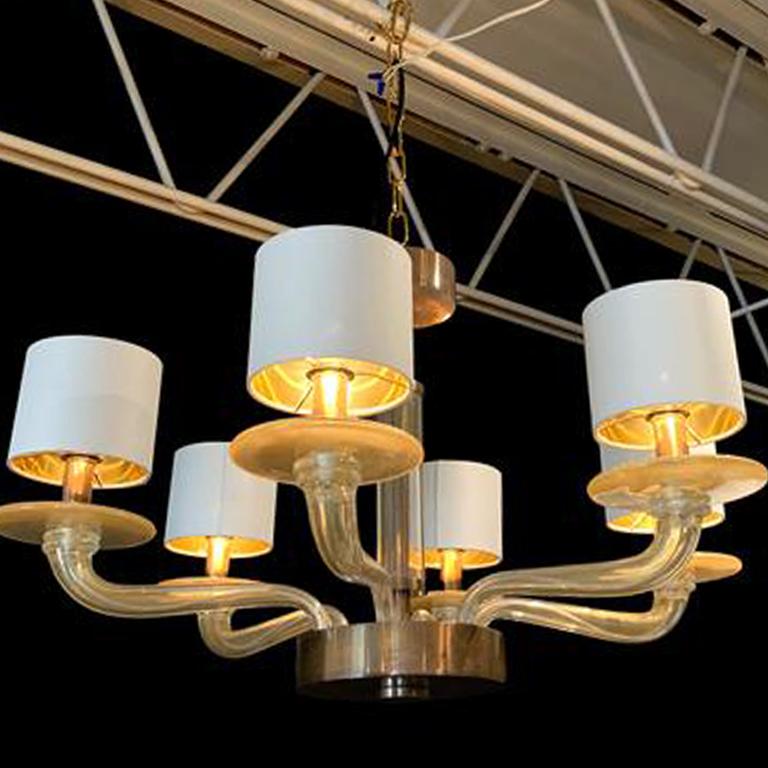 The Eila' chandelier, clear gold glass with burnished metal. Seguso Vetri d'Arte chandelier embody the nature of timeless Seguso style. The technique, color and translucencies, are ideal for a small room. Is with 6 lights, completely handcrafted and