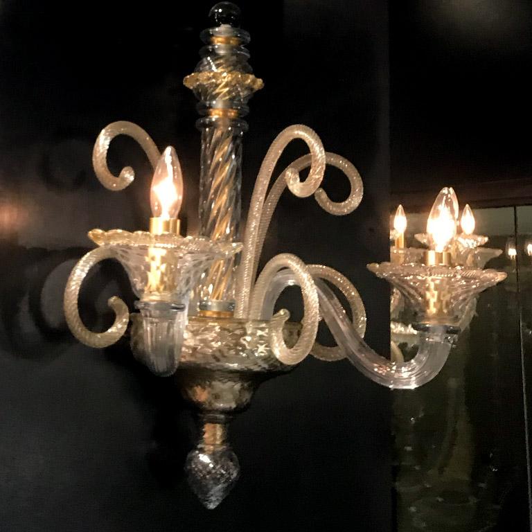 Museo Murano glass sconce by Seguso Vetri d'Arte. Handmade, blown Murano glass sconce in a style reminiscent of historic Rezzonico chandeliers hanging in the Murano Glass Museum in Venice, Italy. The sconce's 2 arms are in antique clear and gold